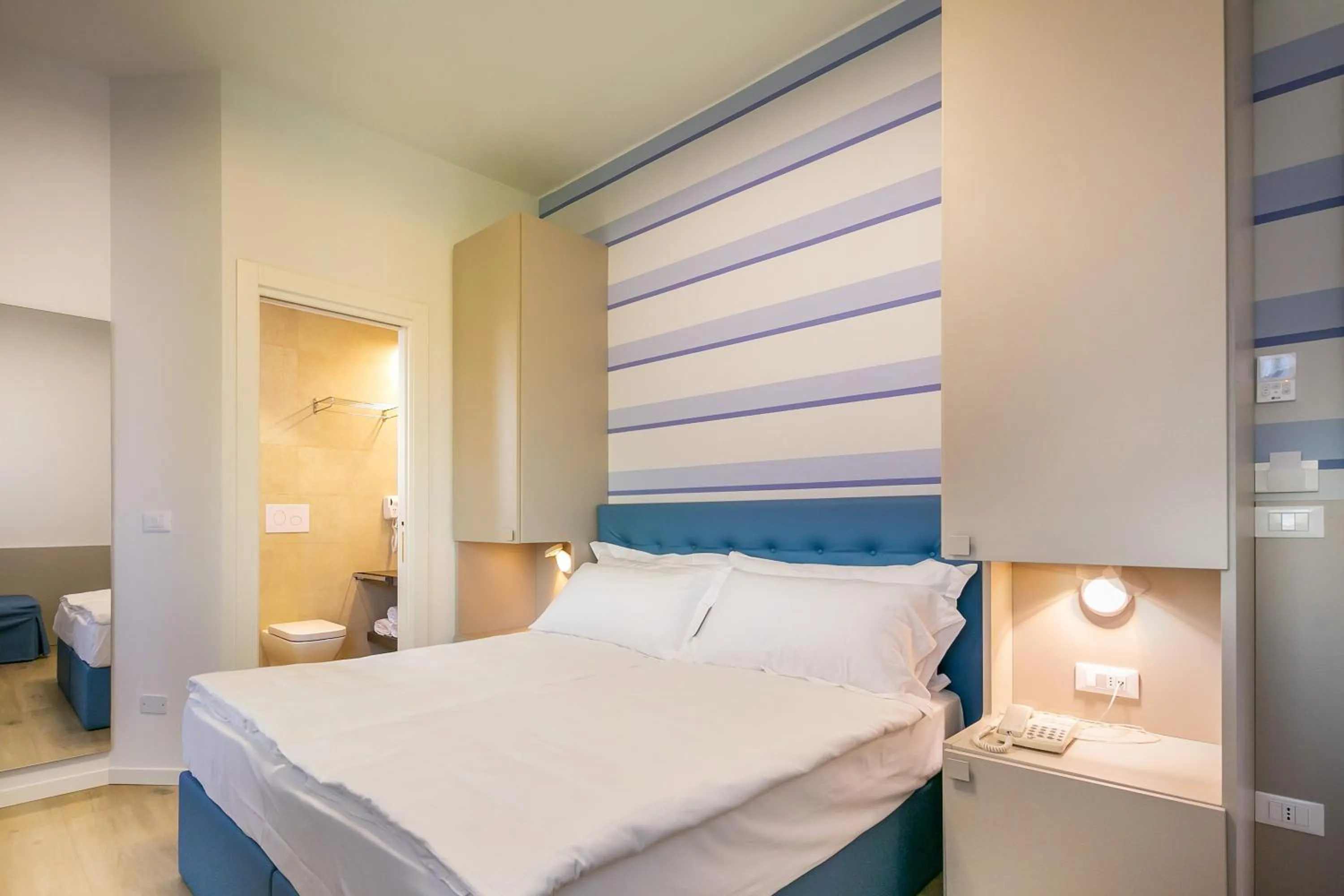 Bedroom in Hotel Le Lampare