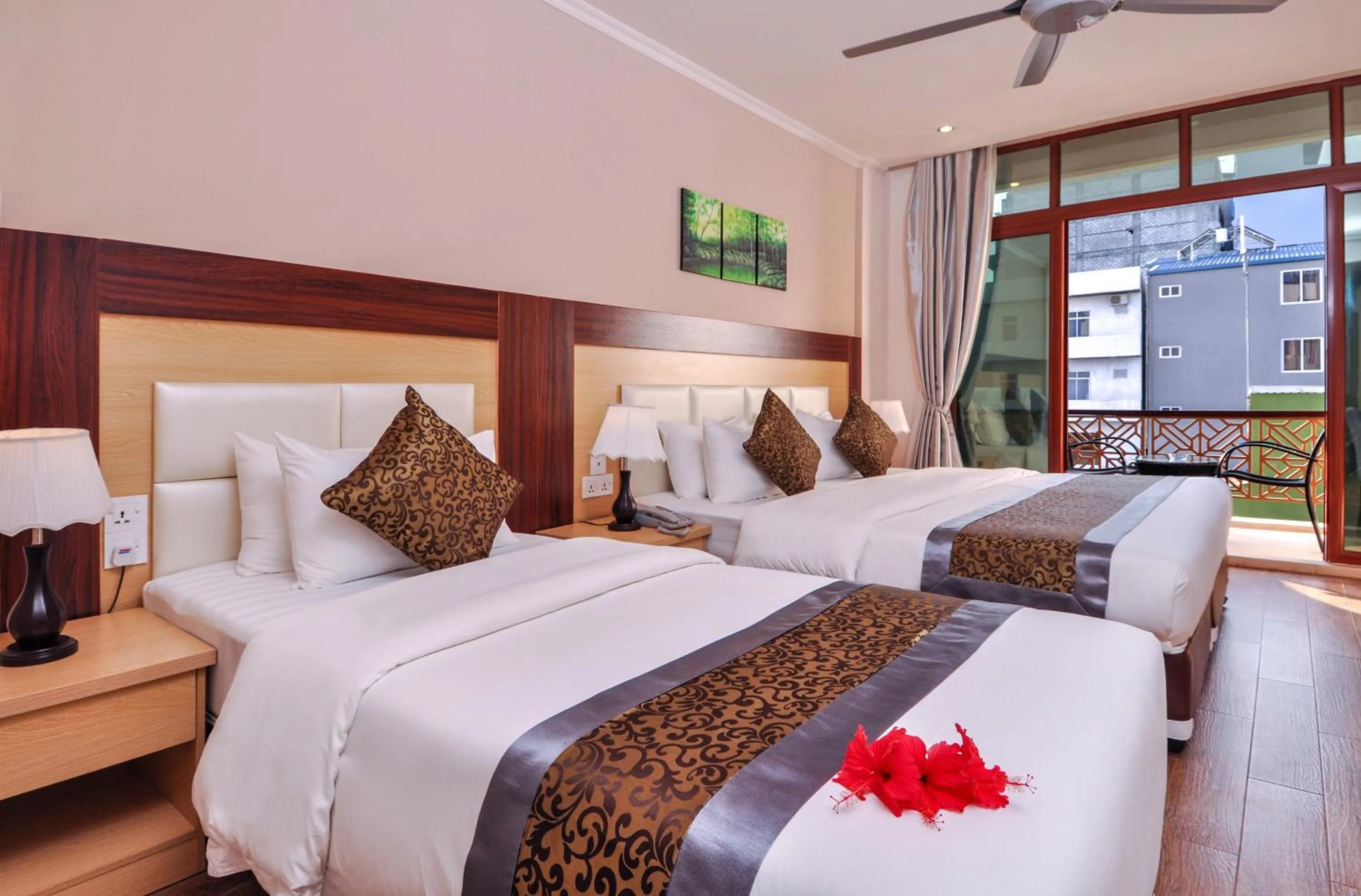 Bed in Triton Beach Hotel & Spa