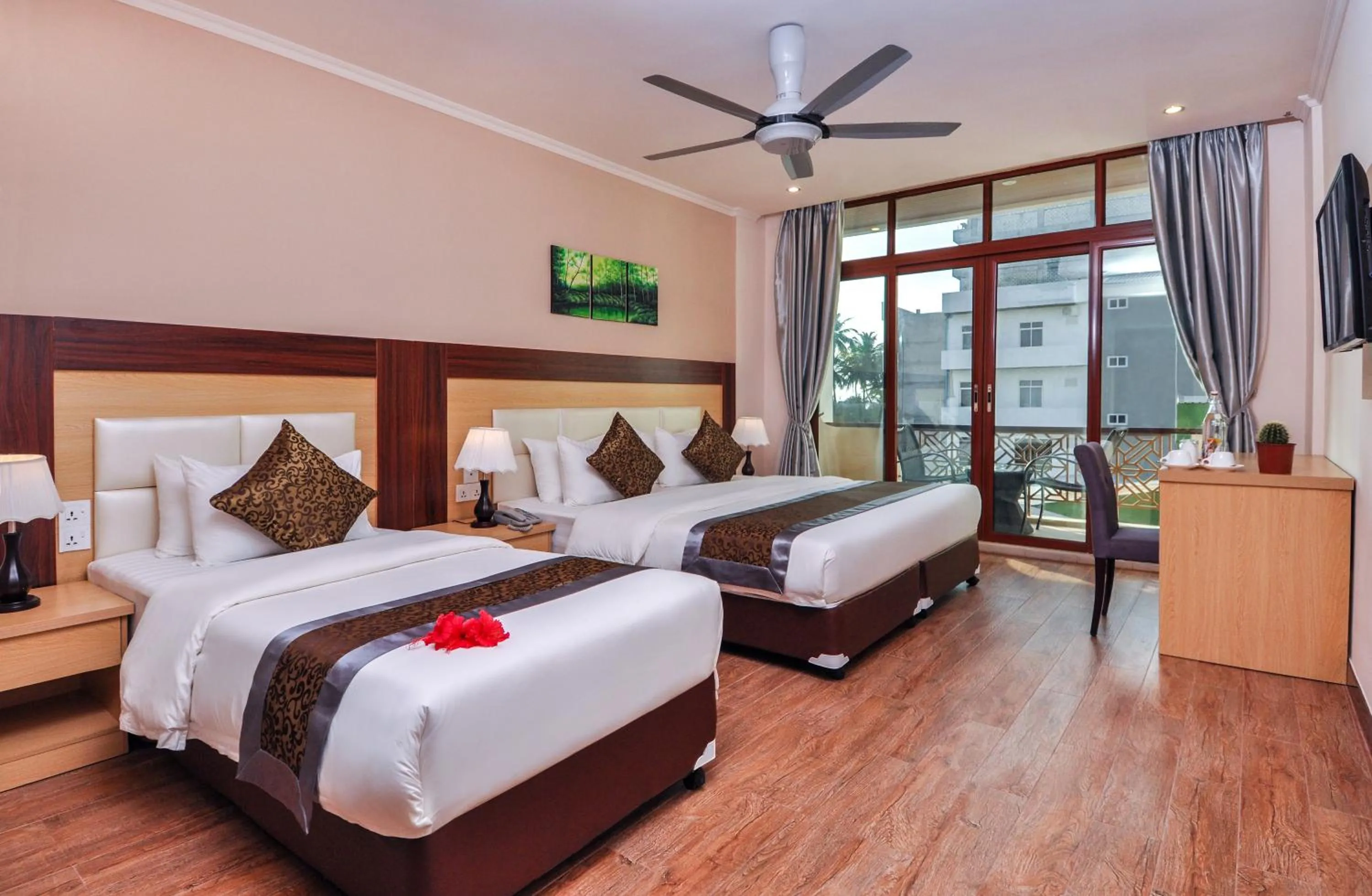 Bed in Triton Beach Hotel & Spa