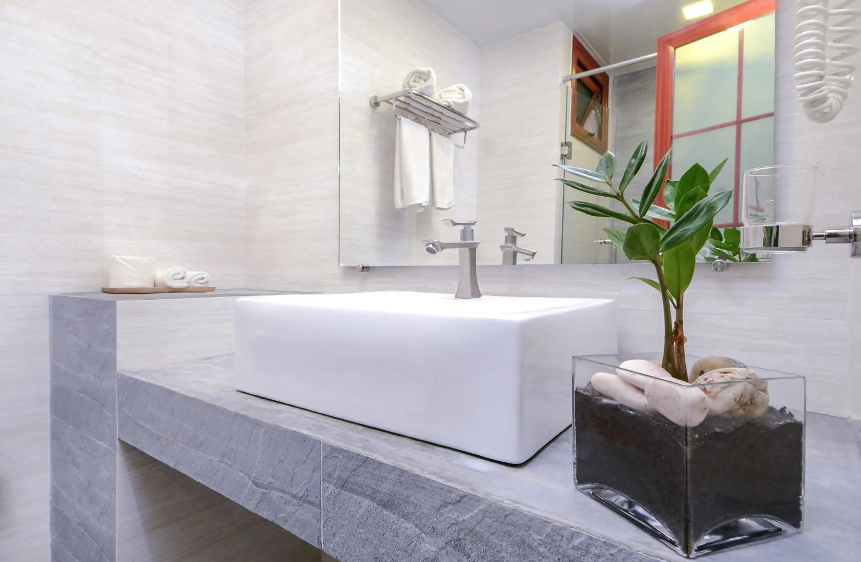 Bathroom in Triton Beach Hotel & Spa