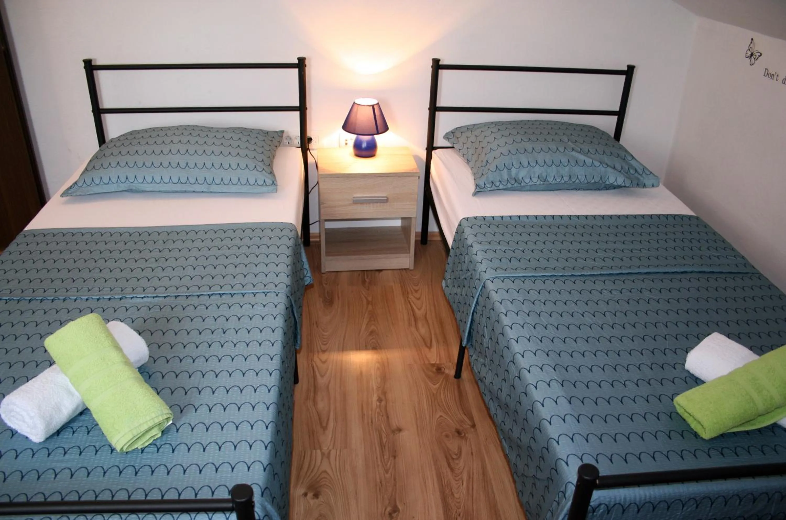 Bedroom, Bed in Luna Maris Apartments