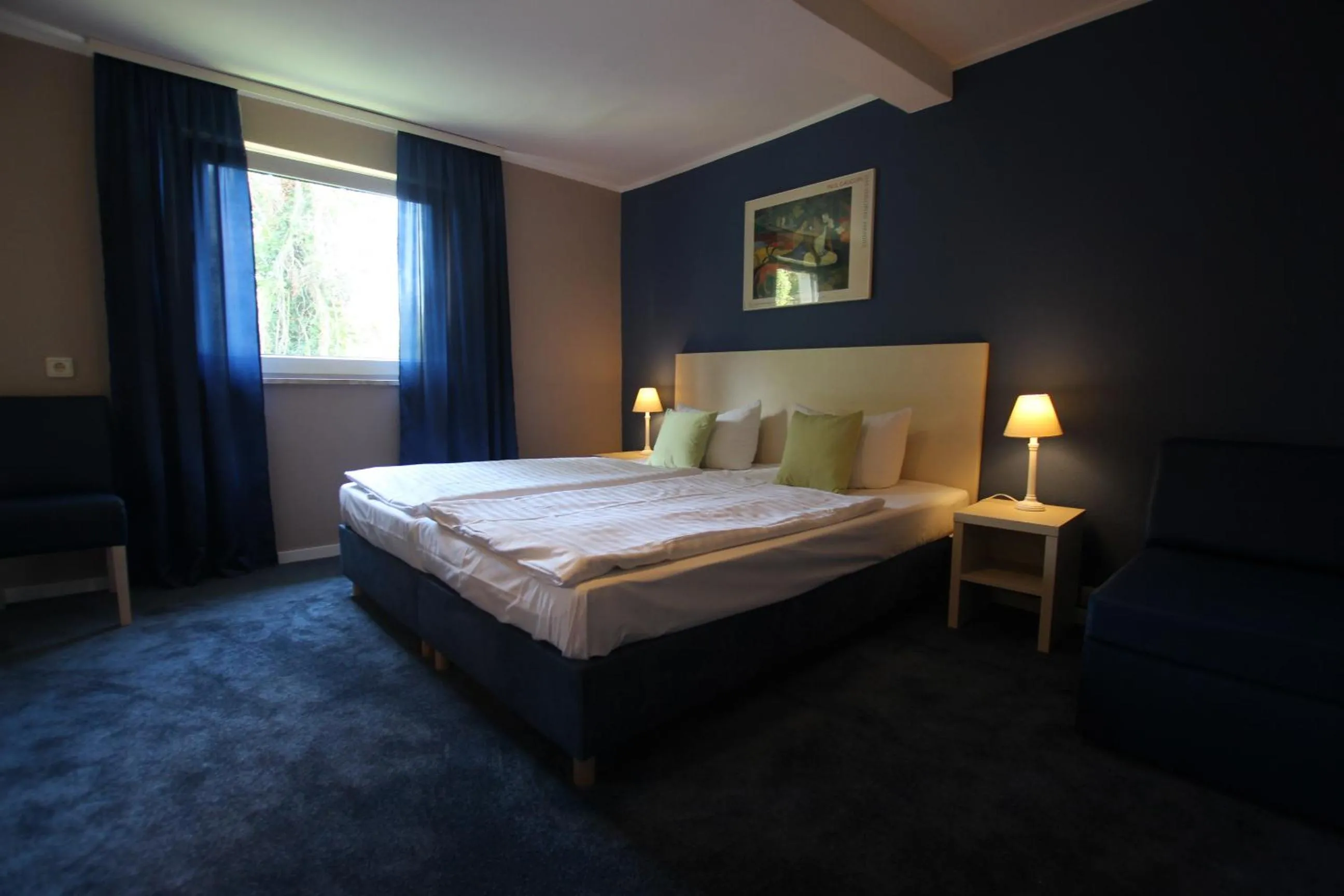 Bed in Hotel Pelikan