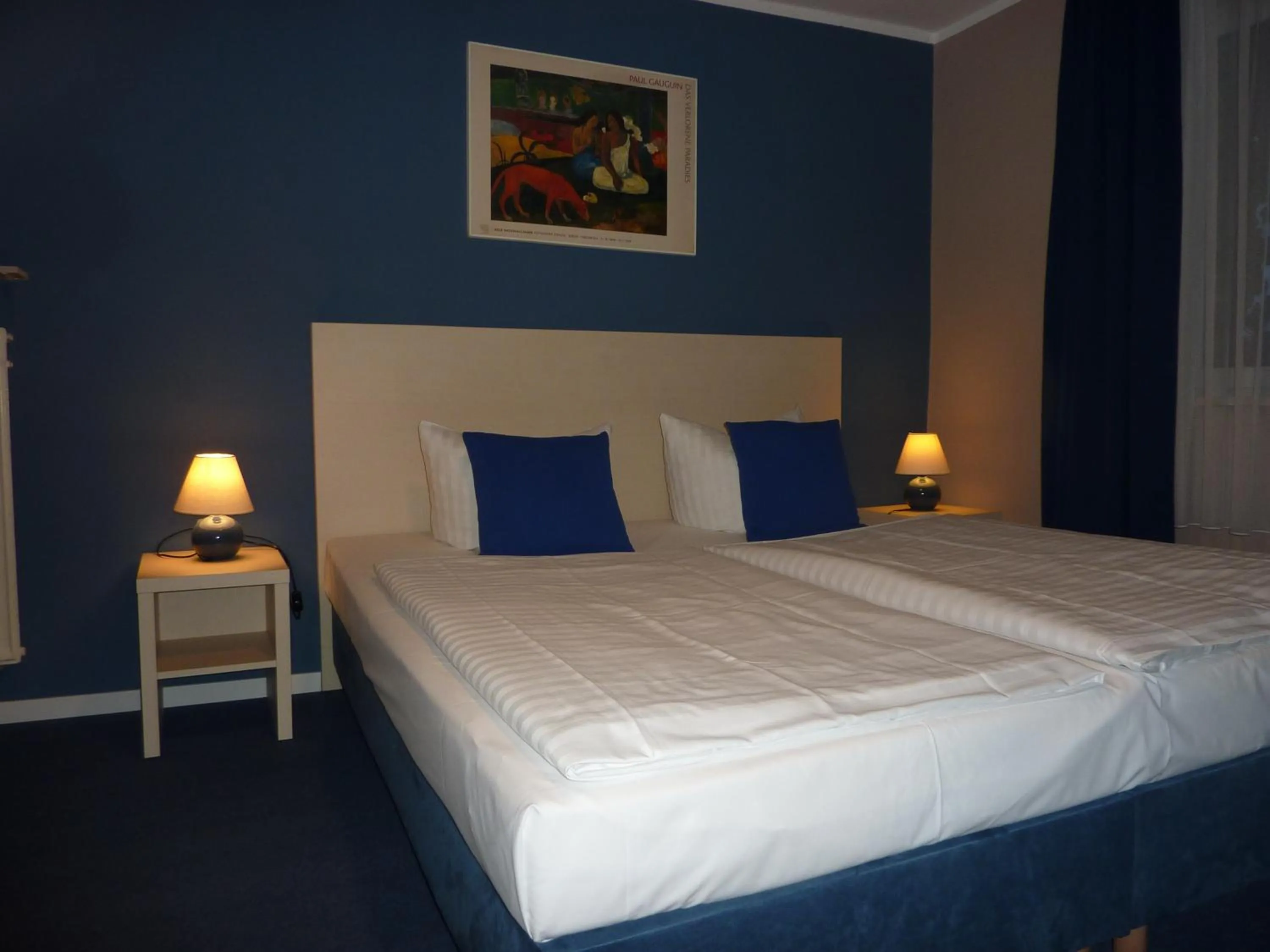 Bed in Hotel Pelikan