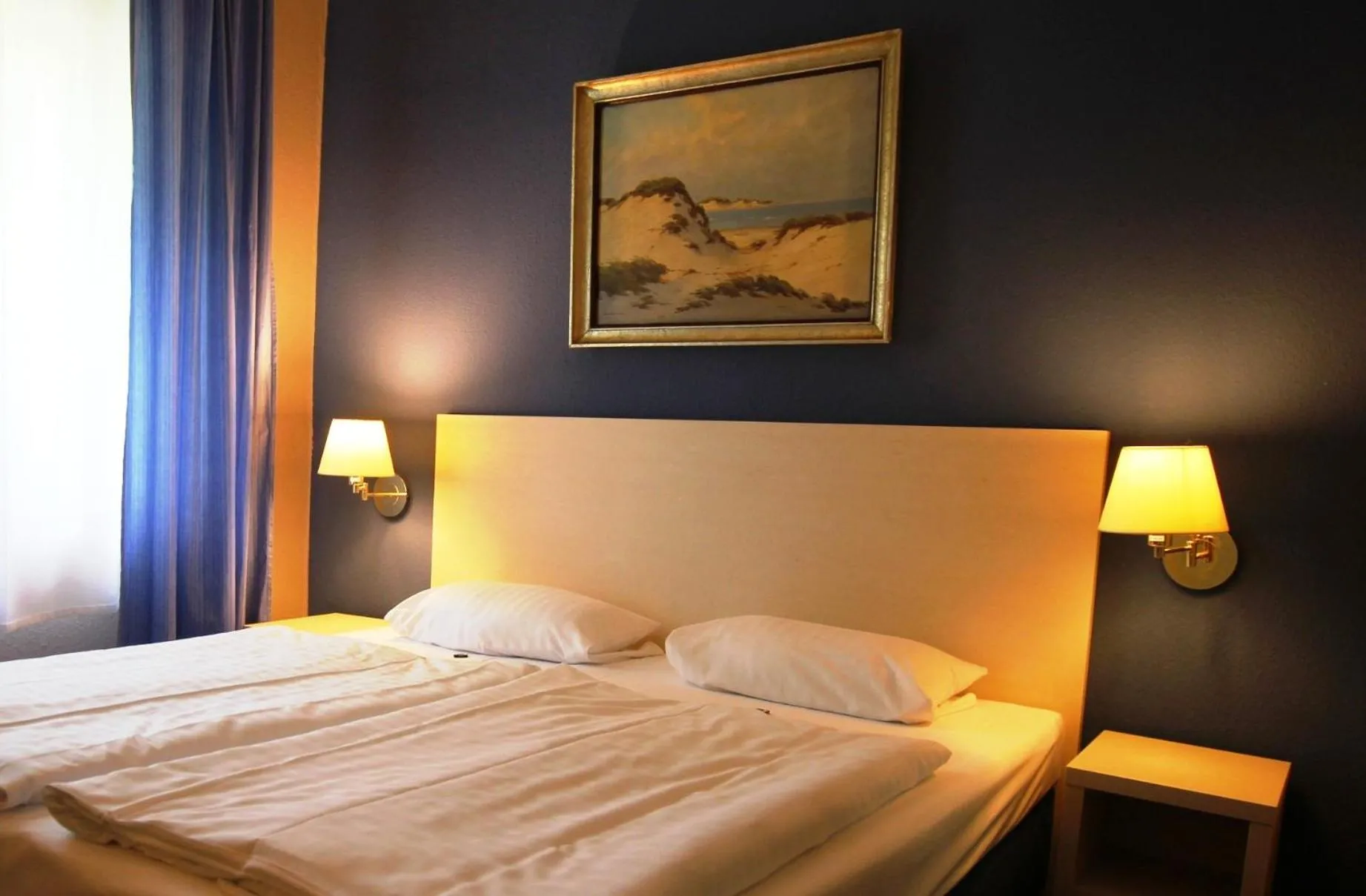 Bed in Hotel Pelikan