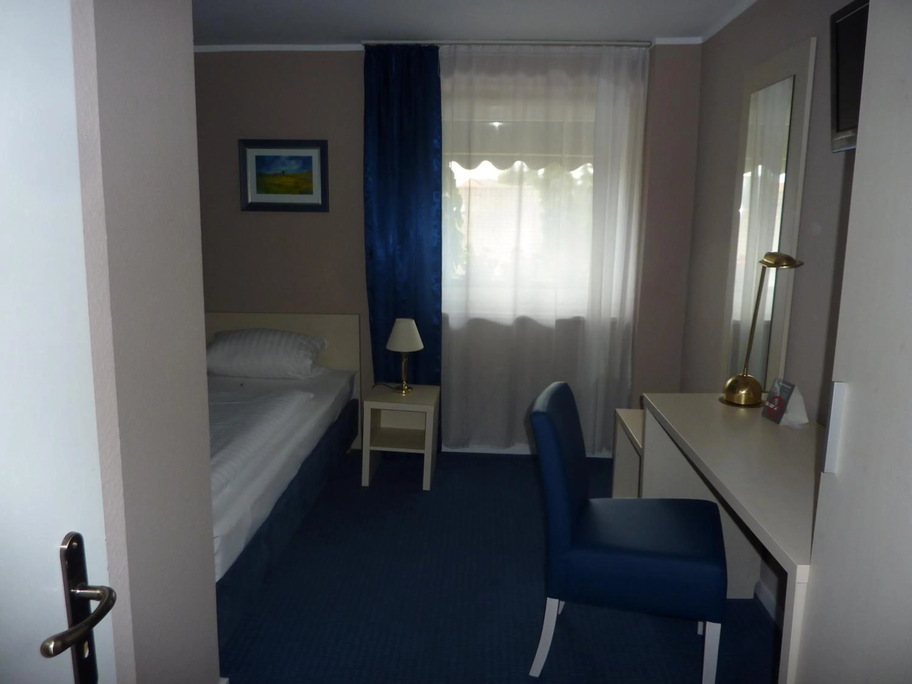 Bed in Hotel Pelikan