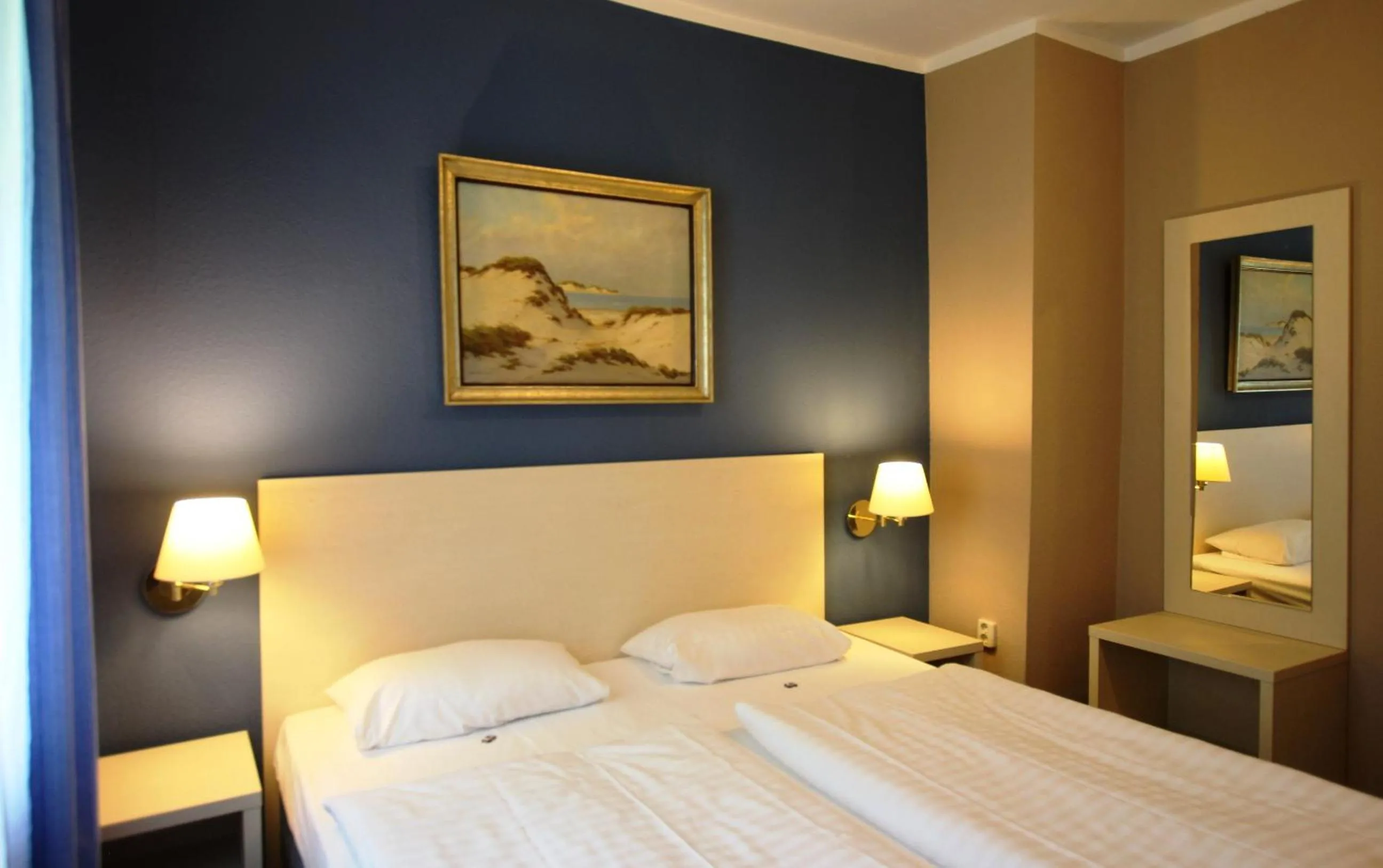 Bed in Hotel Pelikan
