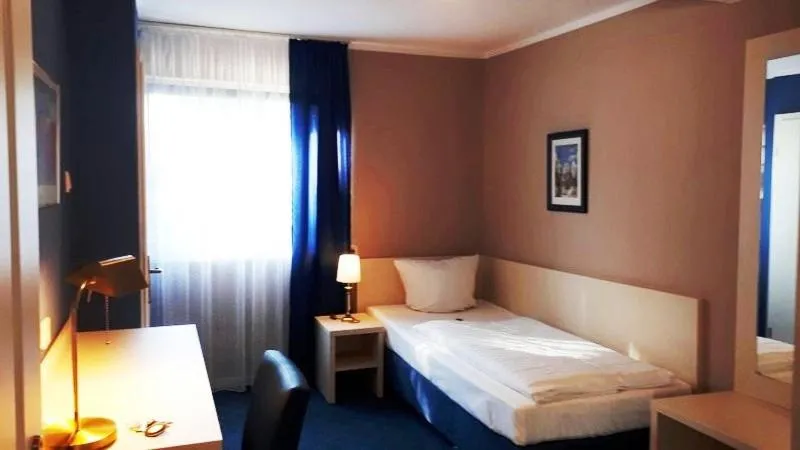 Bed in Hotel Pelikan