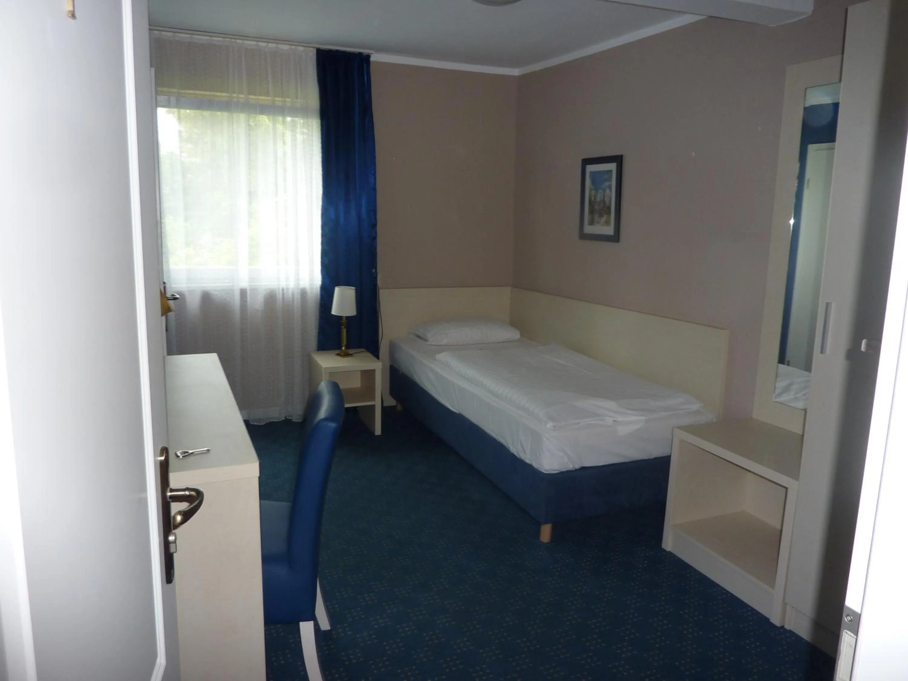 Bed in Hotel Pelikan