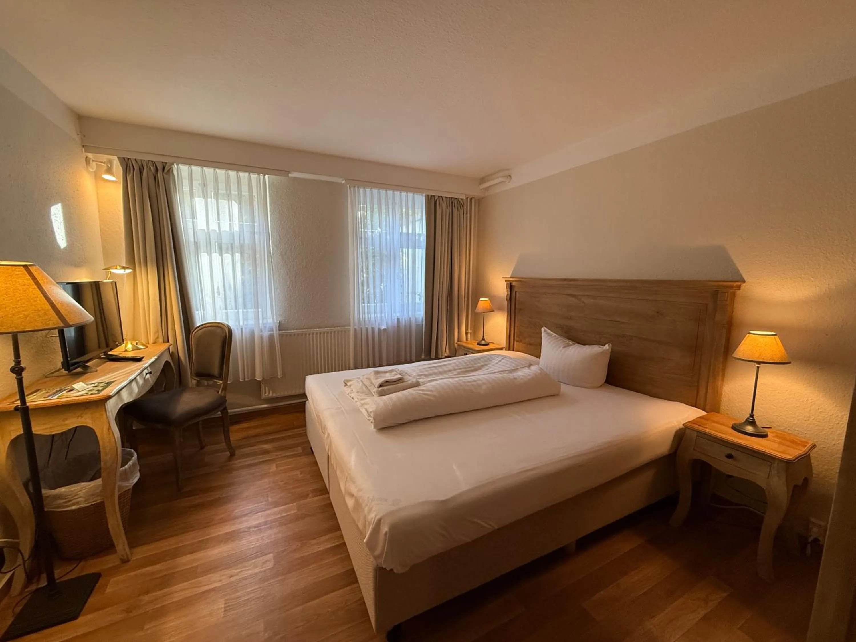 Photo of the whole room, Bed in Gut Sarnow - Hotel und Restaurant