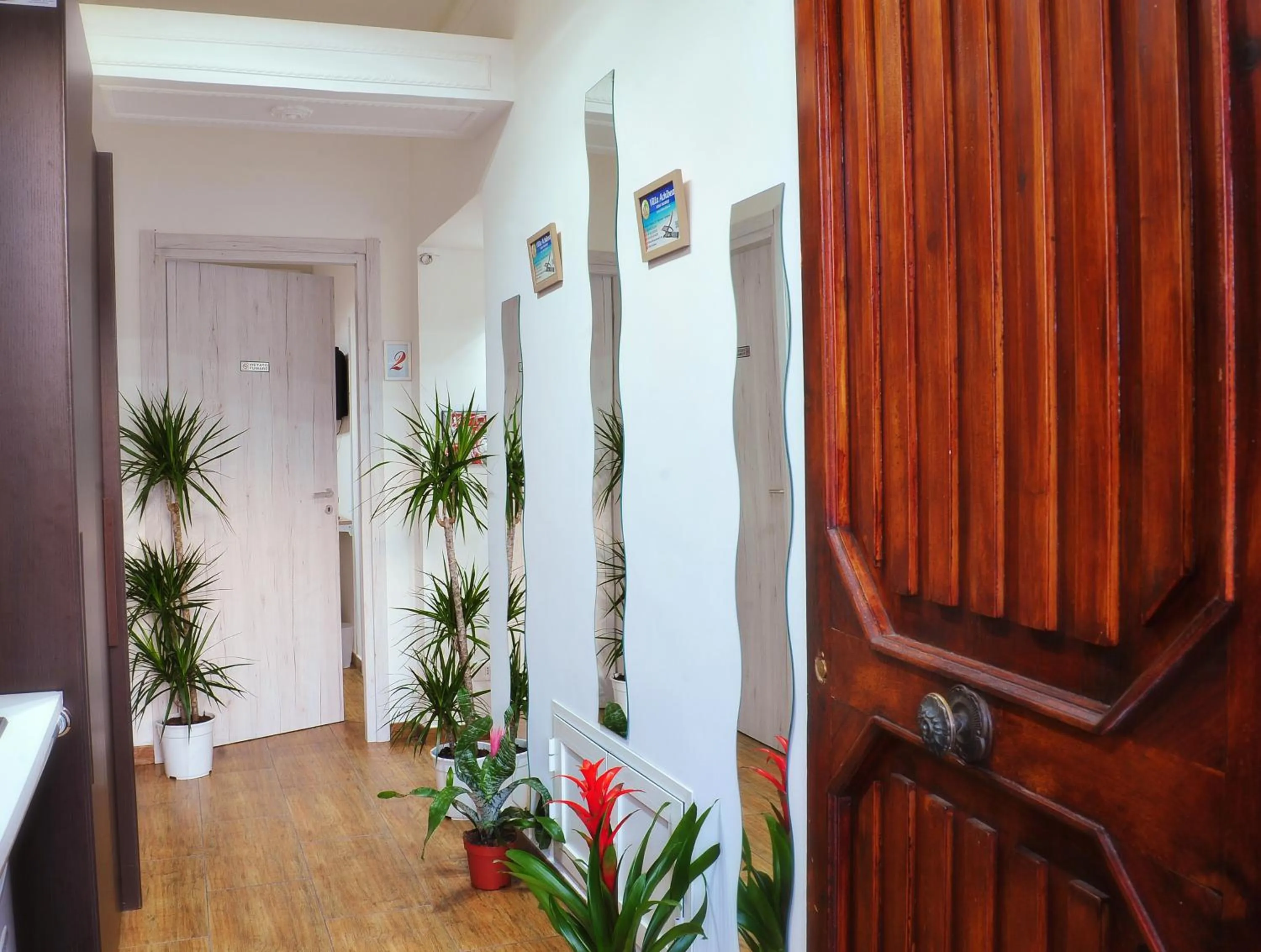 Communal lounge/ TV room in B&B Villa Achibea