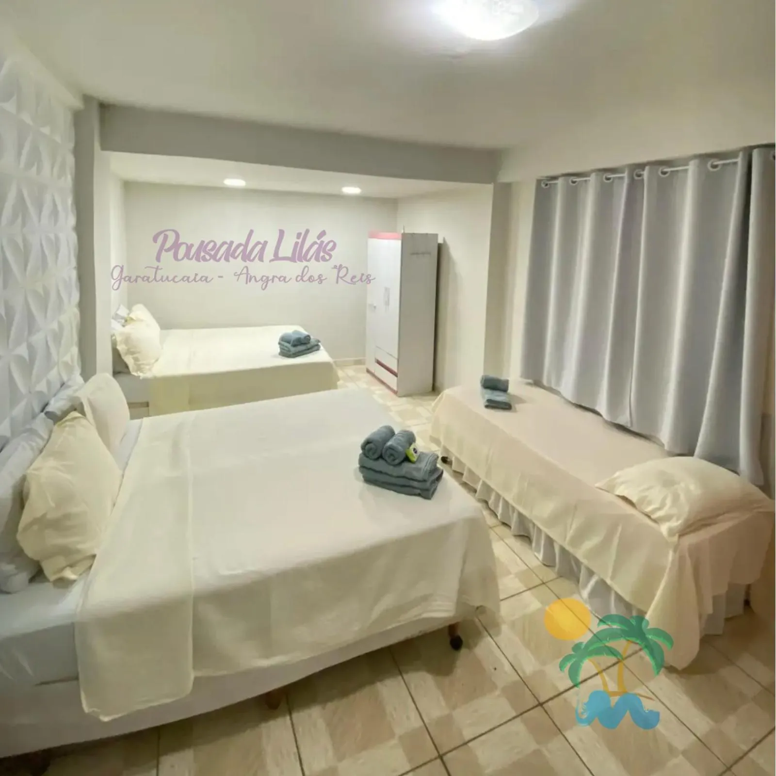 Bed in Pousada Lilás