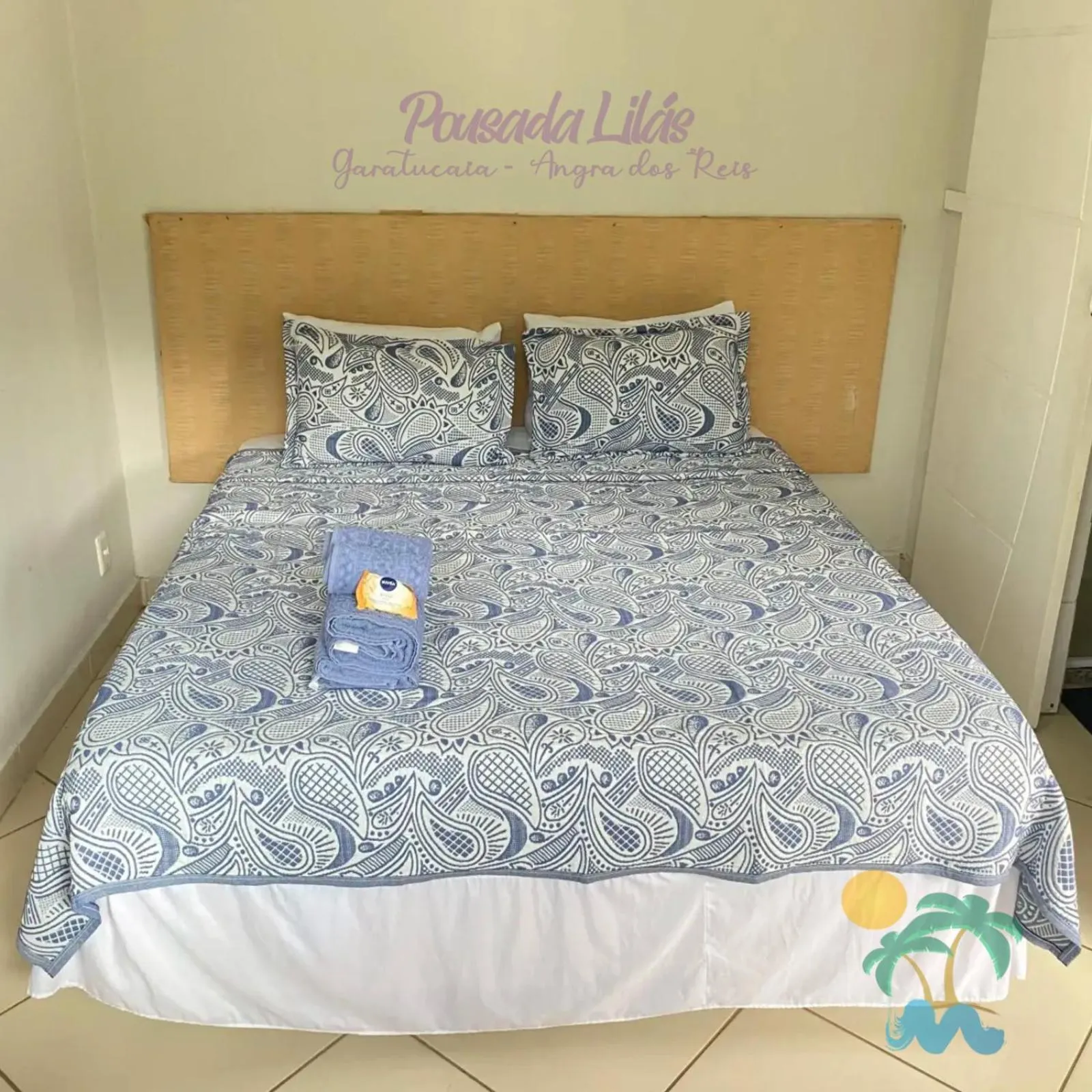 Bed in Pousada Lilás