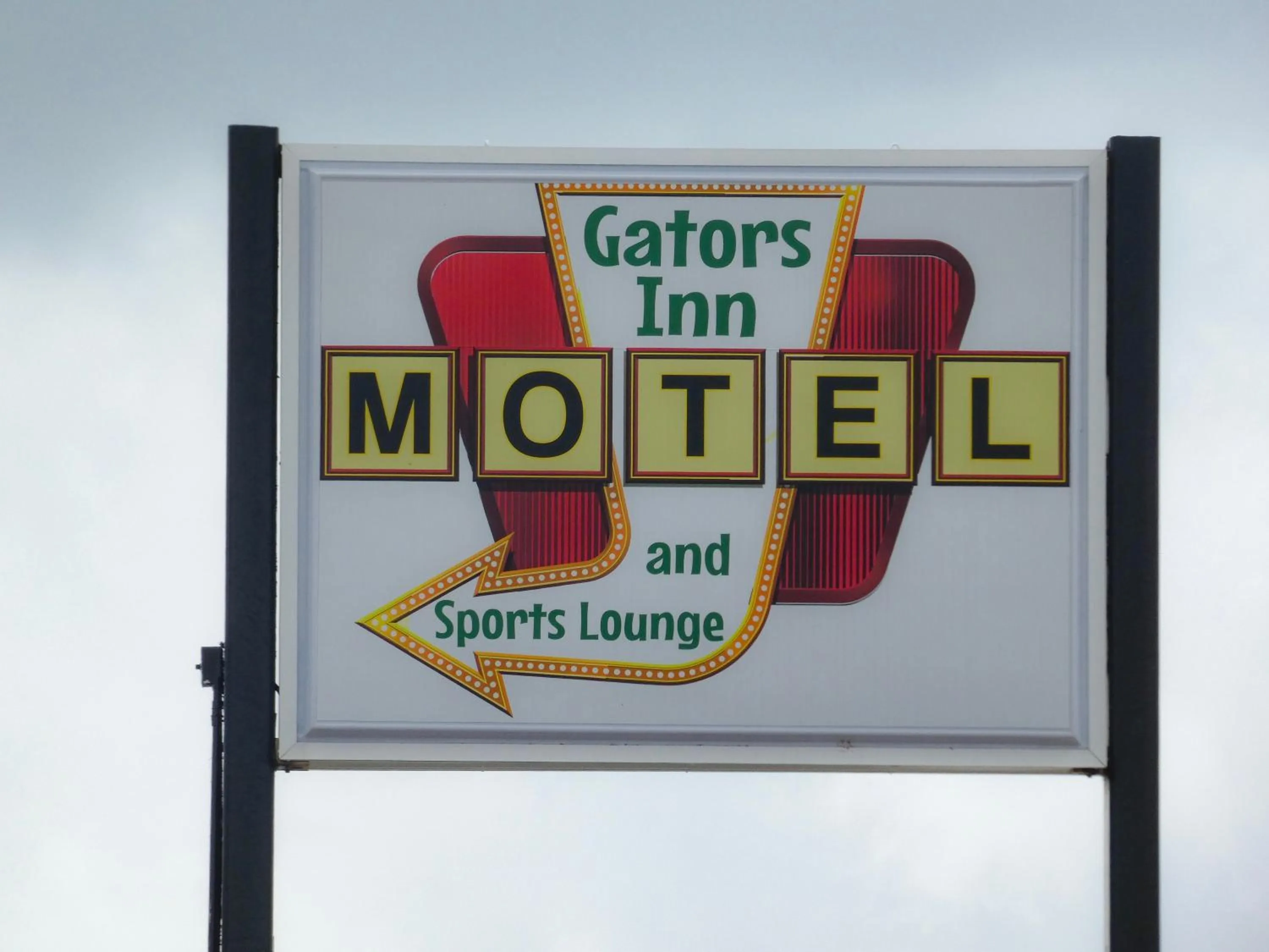 Property logo or sign in Gators Inn on the Bayou