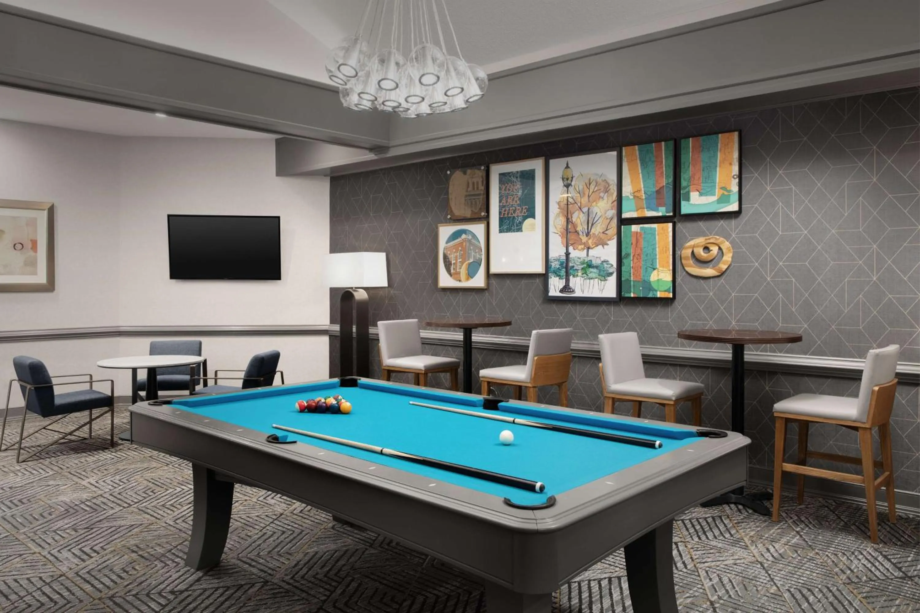 Communal lounge/ TV room in Homewood Suites by Hilton Alexandria