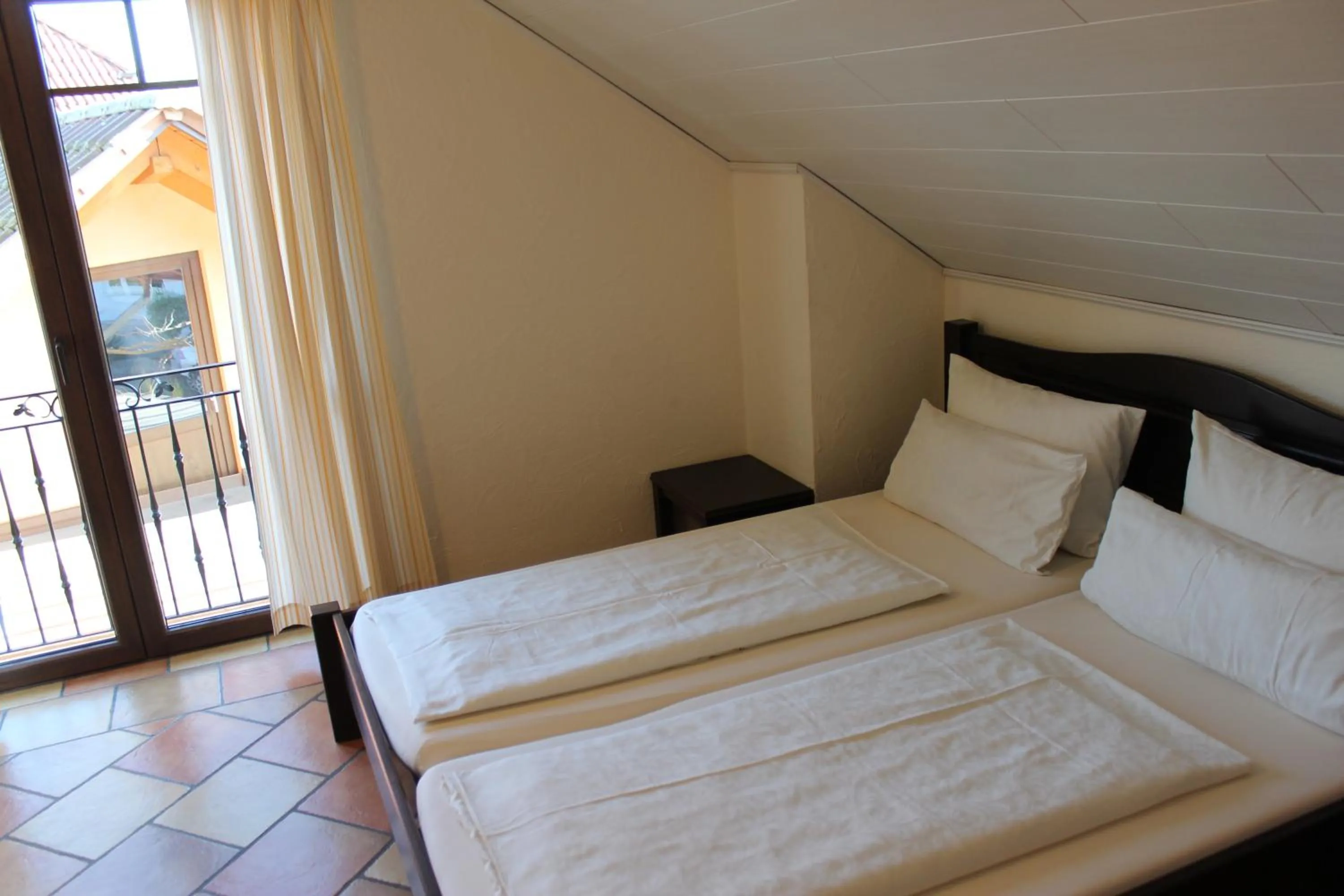 Bed in Pension Vanii, Apartments