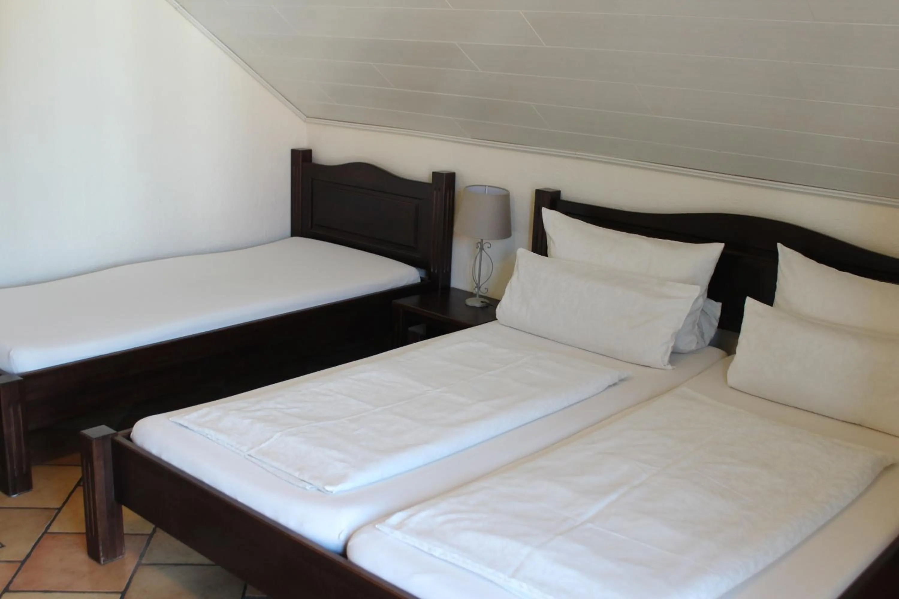 Bed in Pension Vanii, Apartments