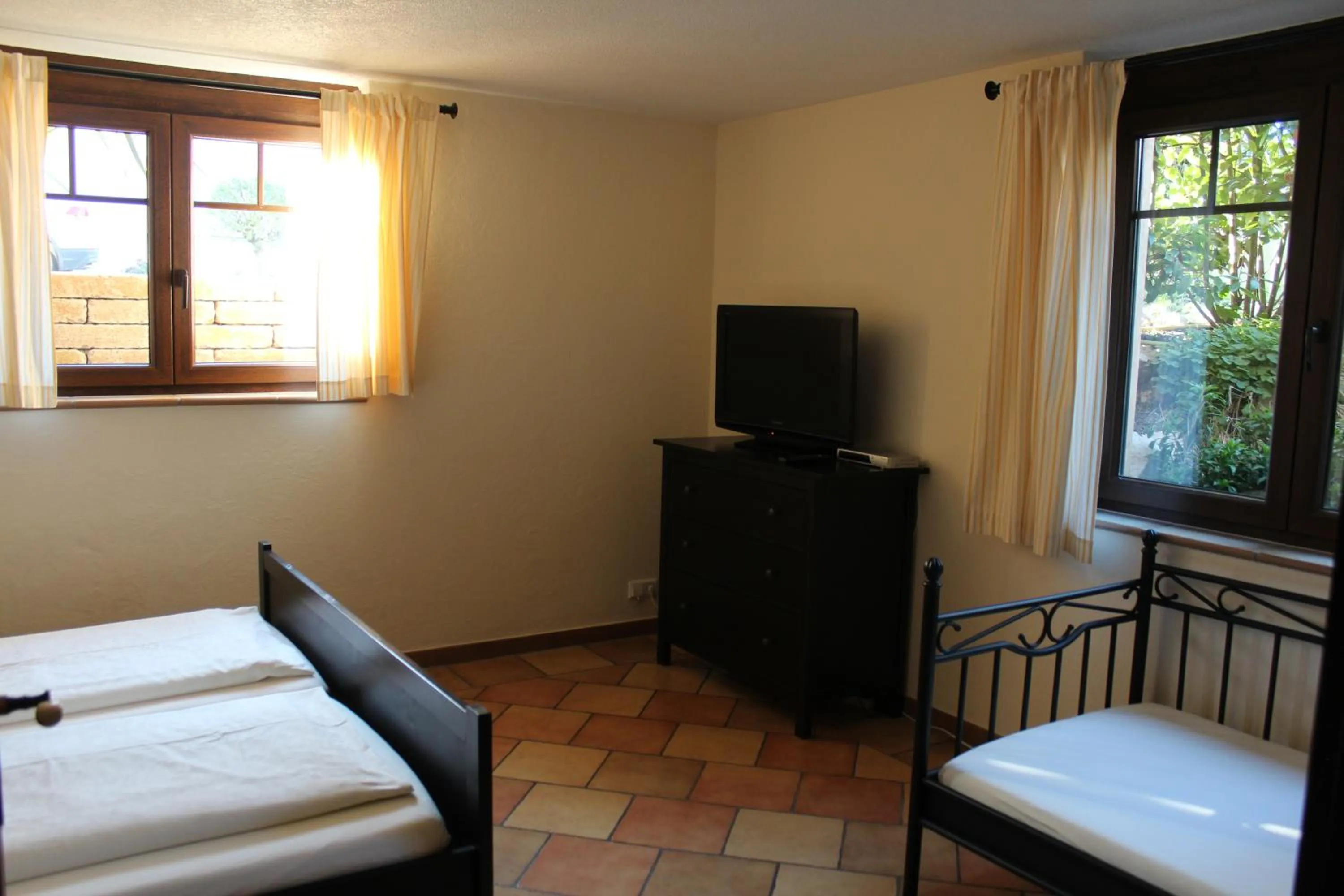 Bed in Pension Vanii, Apartments