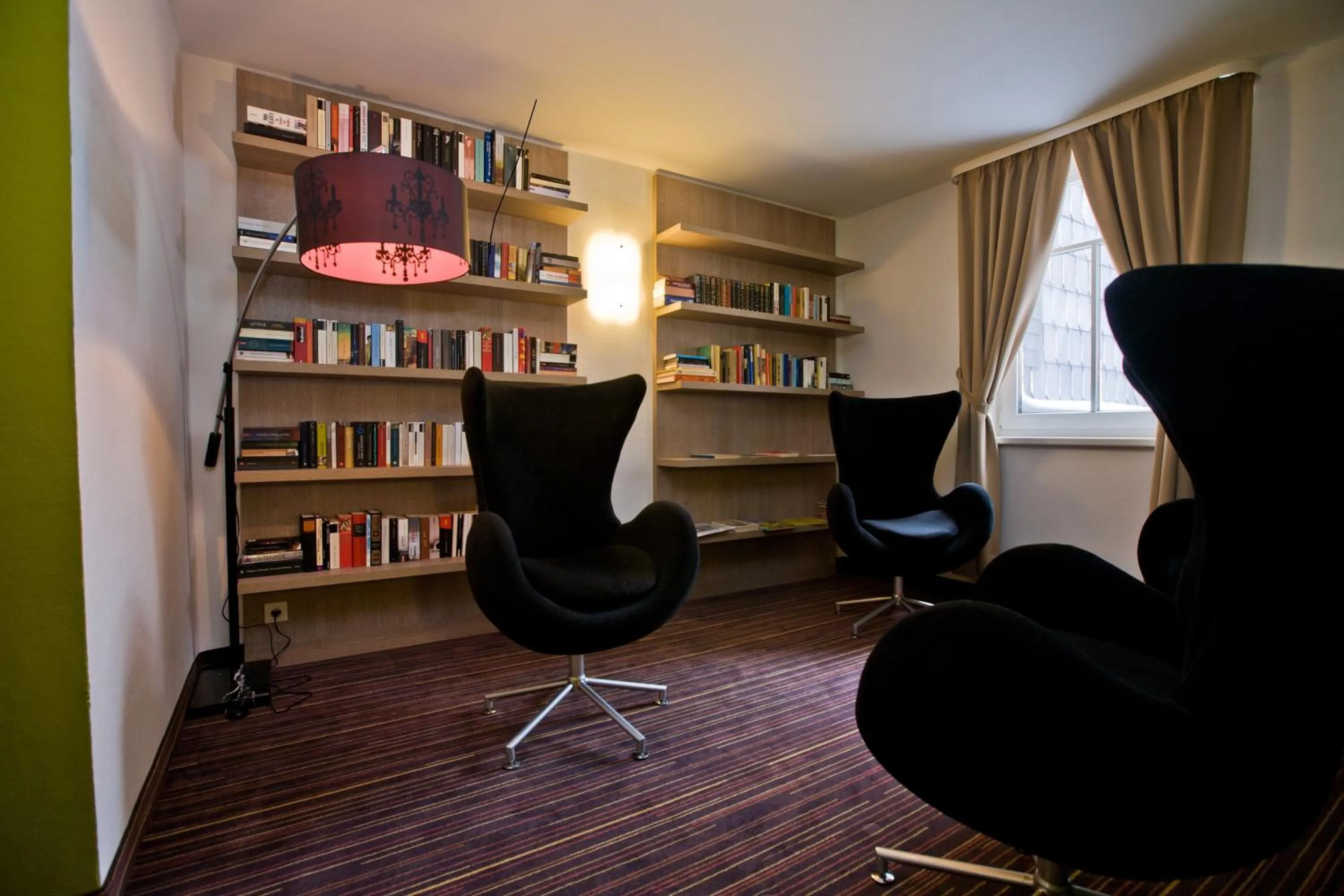 Communal lounge/ TV room in Rathaushotels All Inklusive