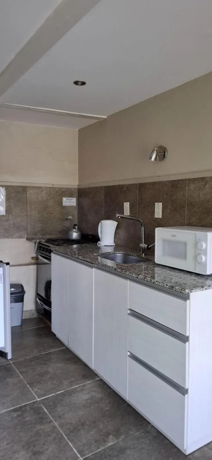 Kitchen or kitchenette in La Fontana Cabañas