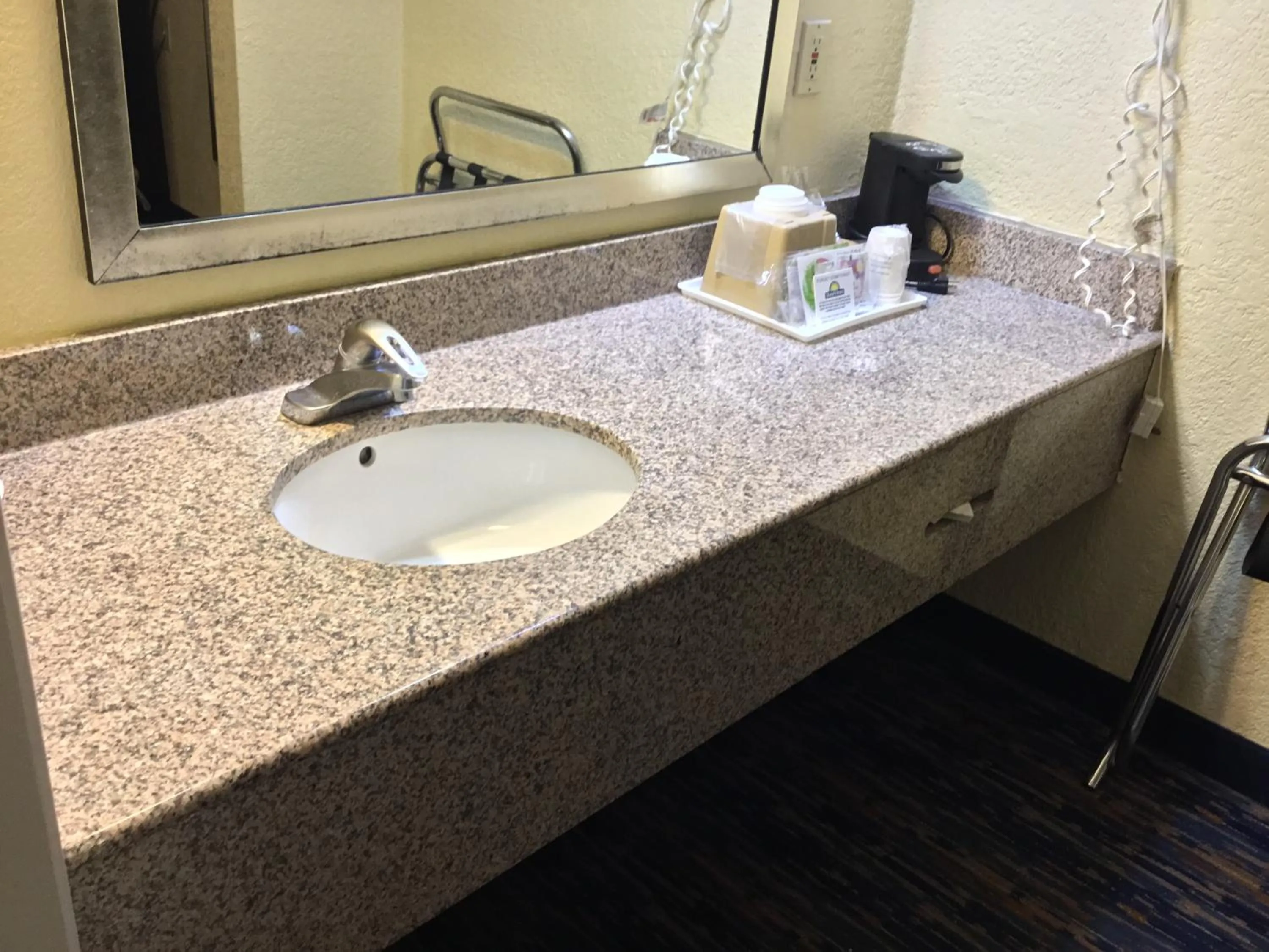 Bathroom in Days Inn by Wyndham Near Seaworld San Antonio
