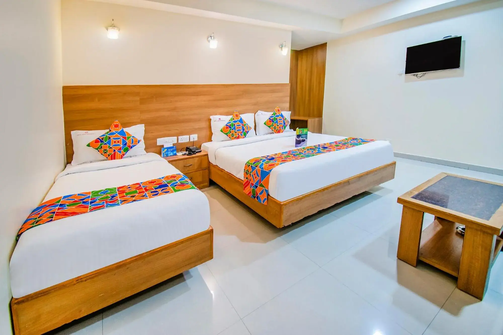 Bed in FabHotel Jansi Deluxe - Nr Gandhipuram Bus stand Bed in FabHotel Jansi Deluxe - Nr Gandhipuram Bus stand