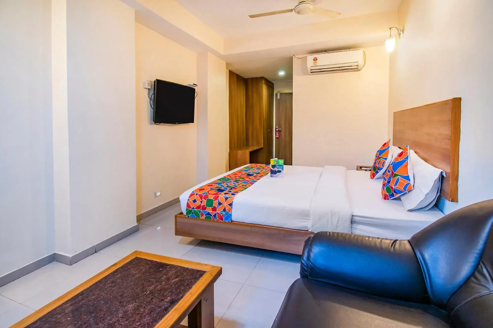 Bed in FabHotel Jansi Deluxe - Nr Gandhipuram Bus stand Bed in FabHotel Jansi Deluxe - Nr Gandhipuram Bus stand