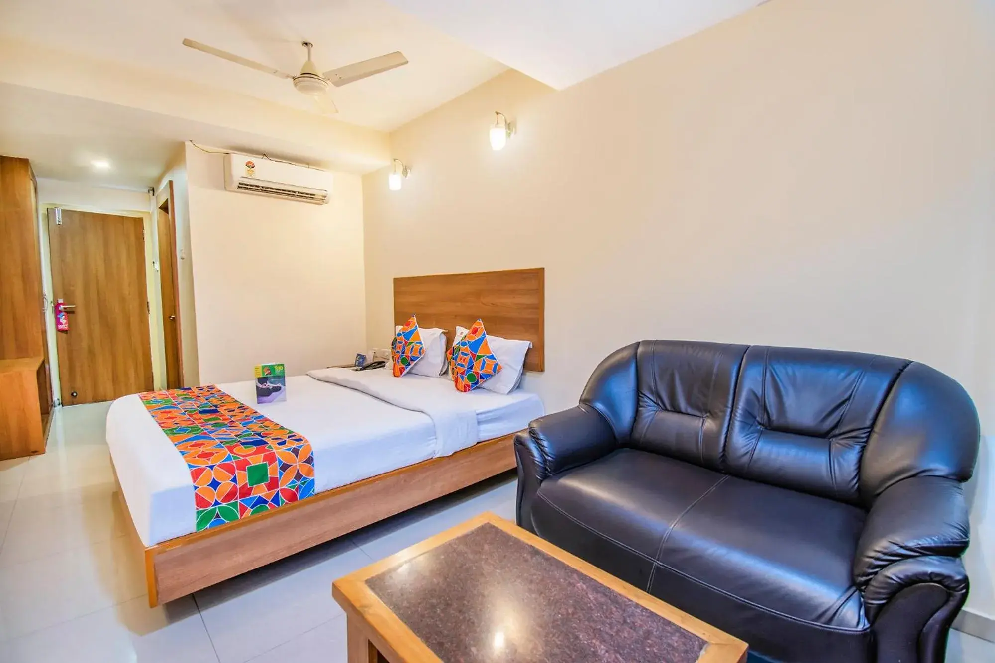 Bed in FabHotel Jansi Deluxe - Nr Gandhipuram Bus stand Bed in FabHotel Jansi Deluxe - Nr Gandhipuram Bus stand