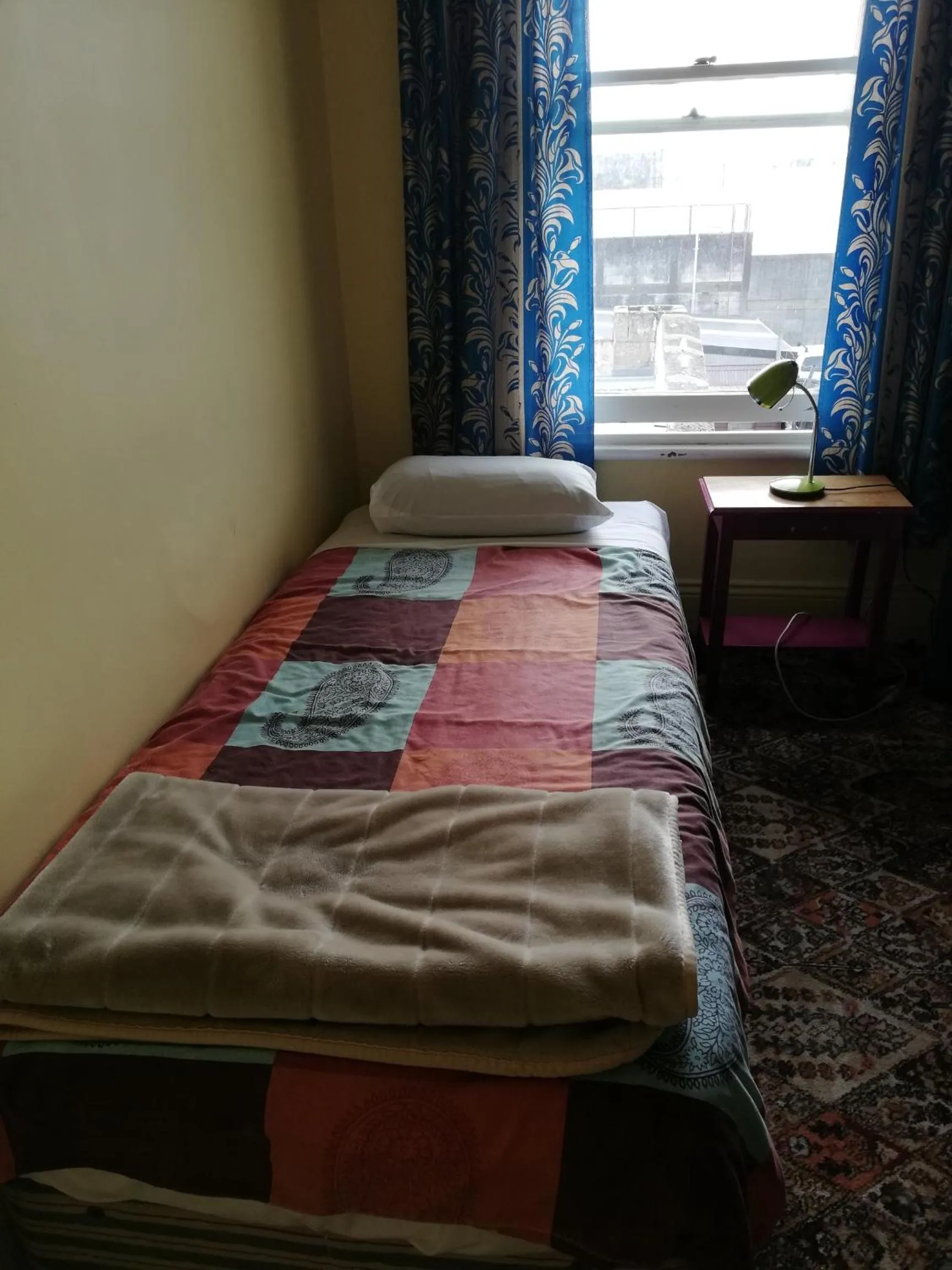 Bed in Empire Hotel Backpackers