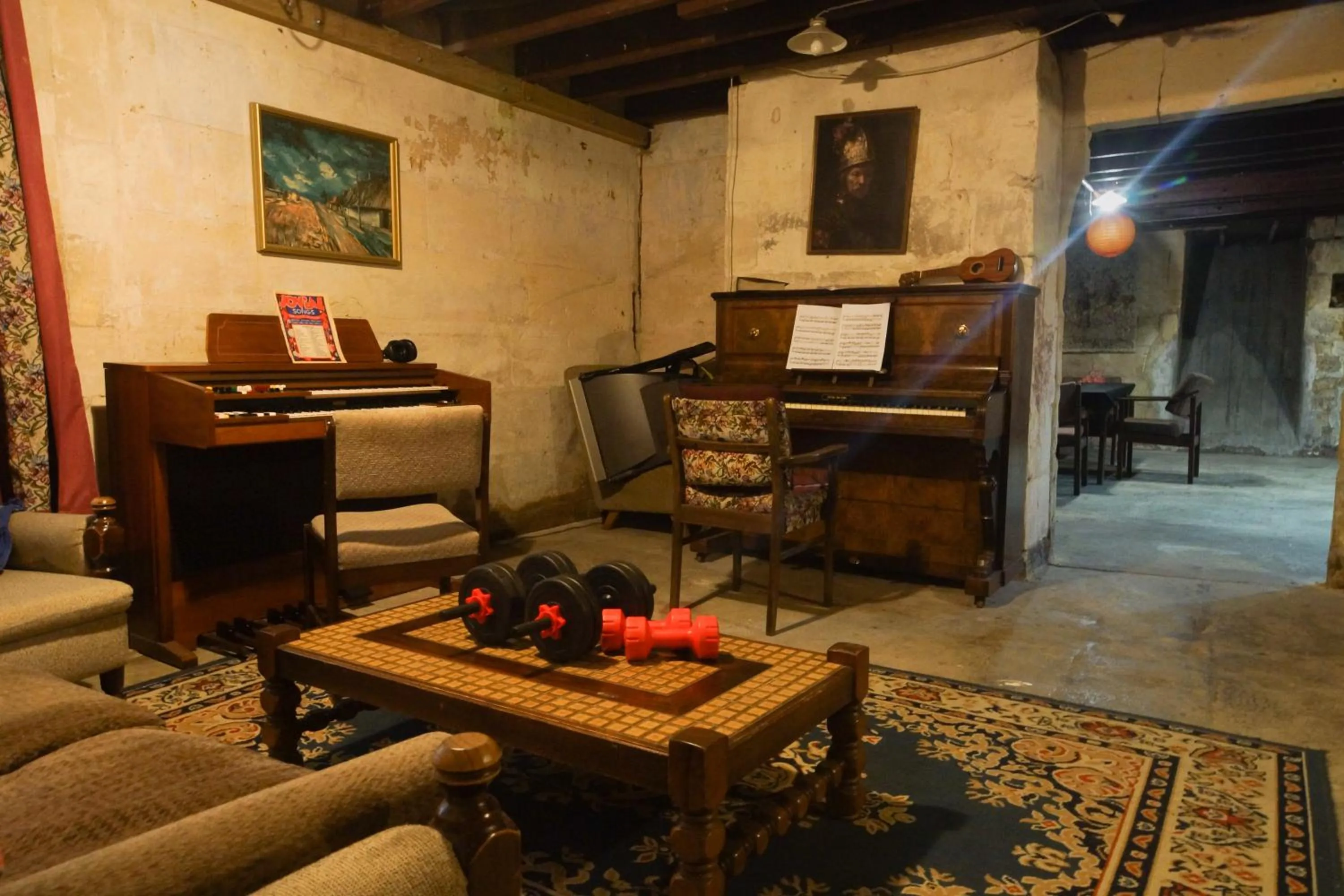 Communal lounge/ TV room in Empire Hotel Backpackers