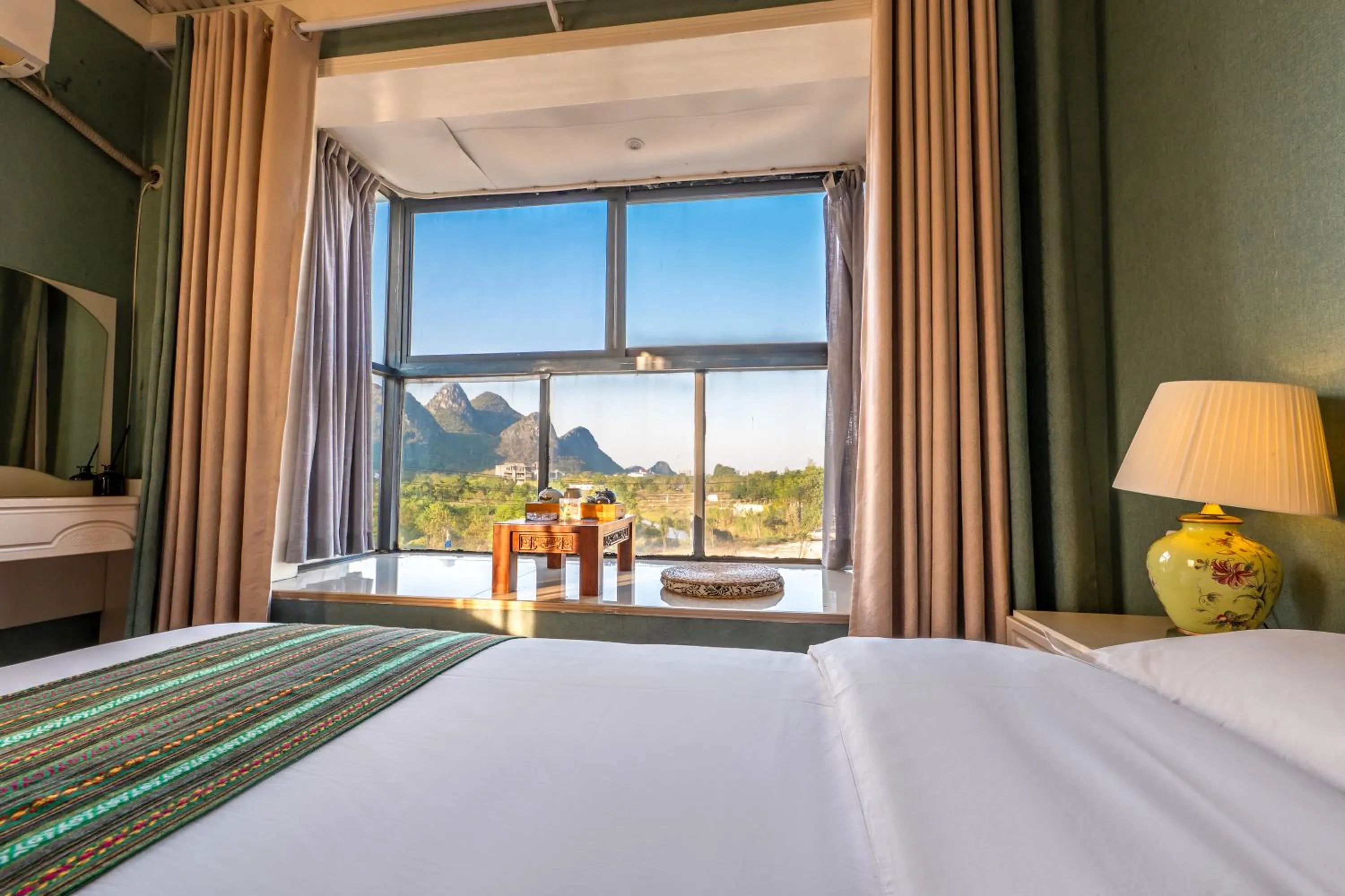 Bed in Secret Courtyard Resort Hotel