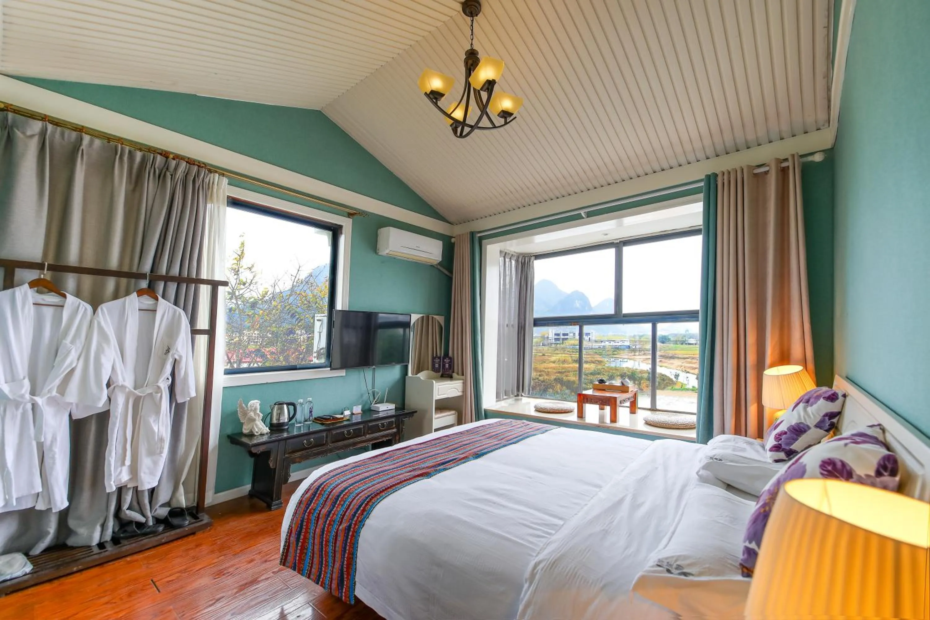 Bed in Secret Courtyard Resort Hotel