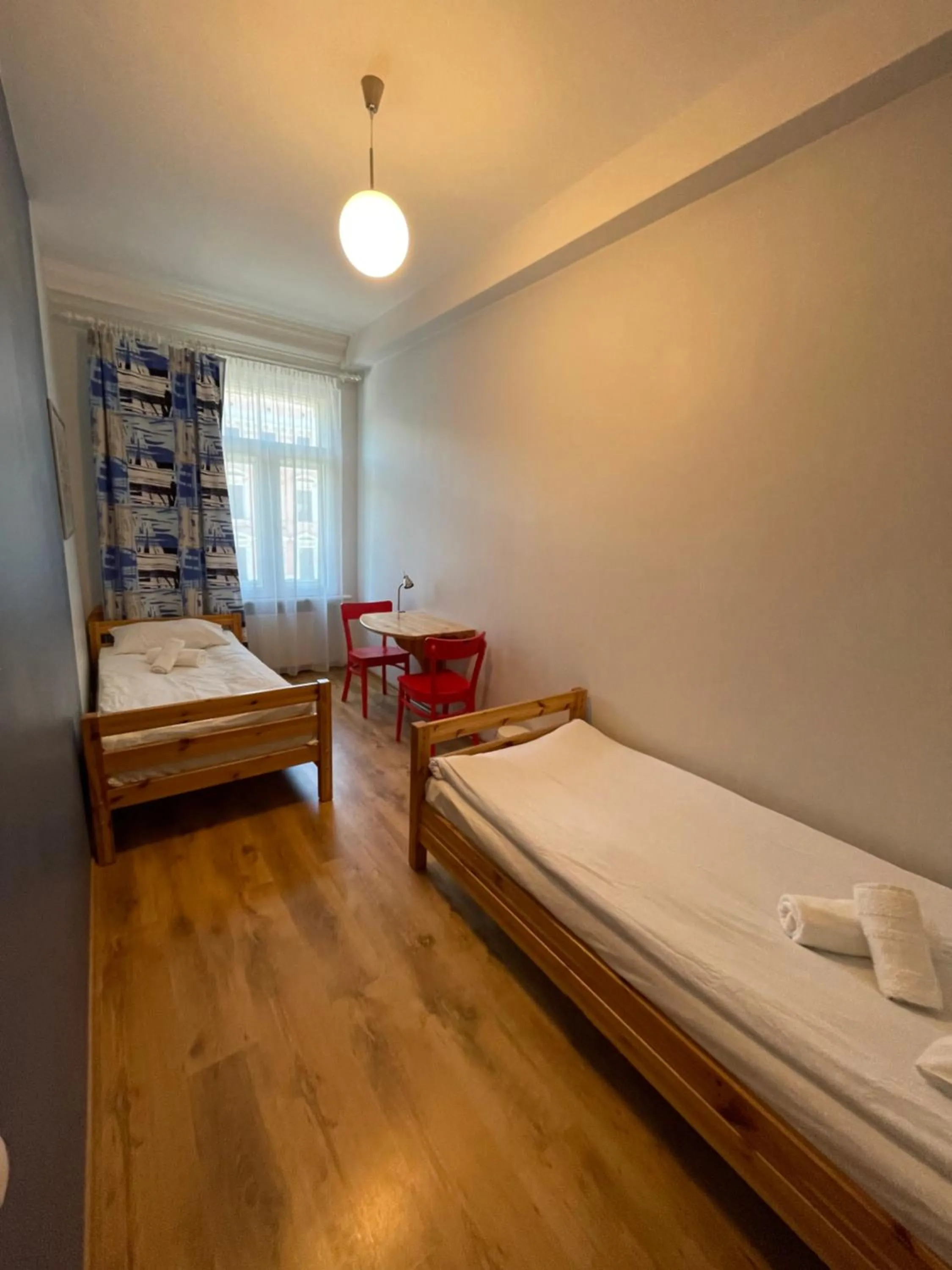 Photo of the whole room, Bed in Orange Cat Rooms