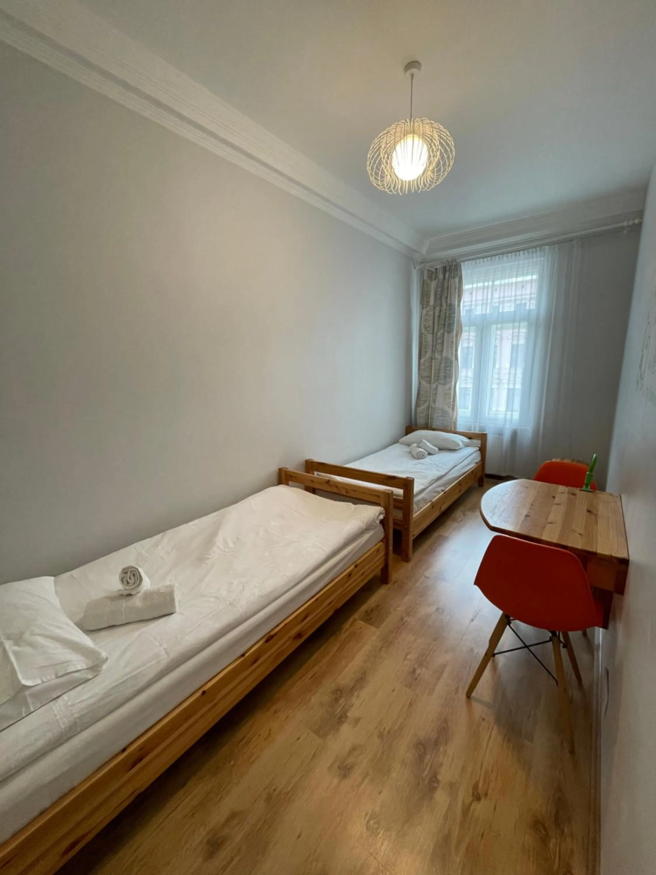 Photo of the whole room, Bed in Orange Cat Rooms