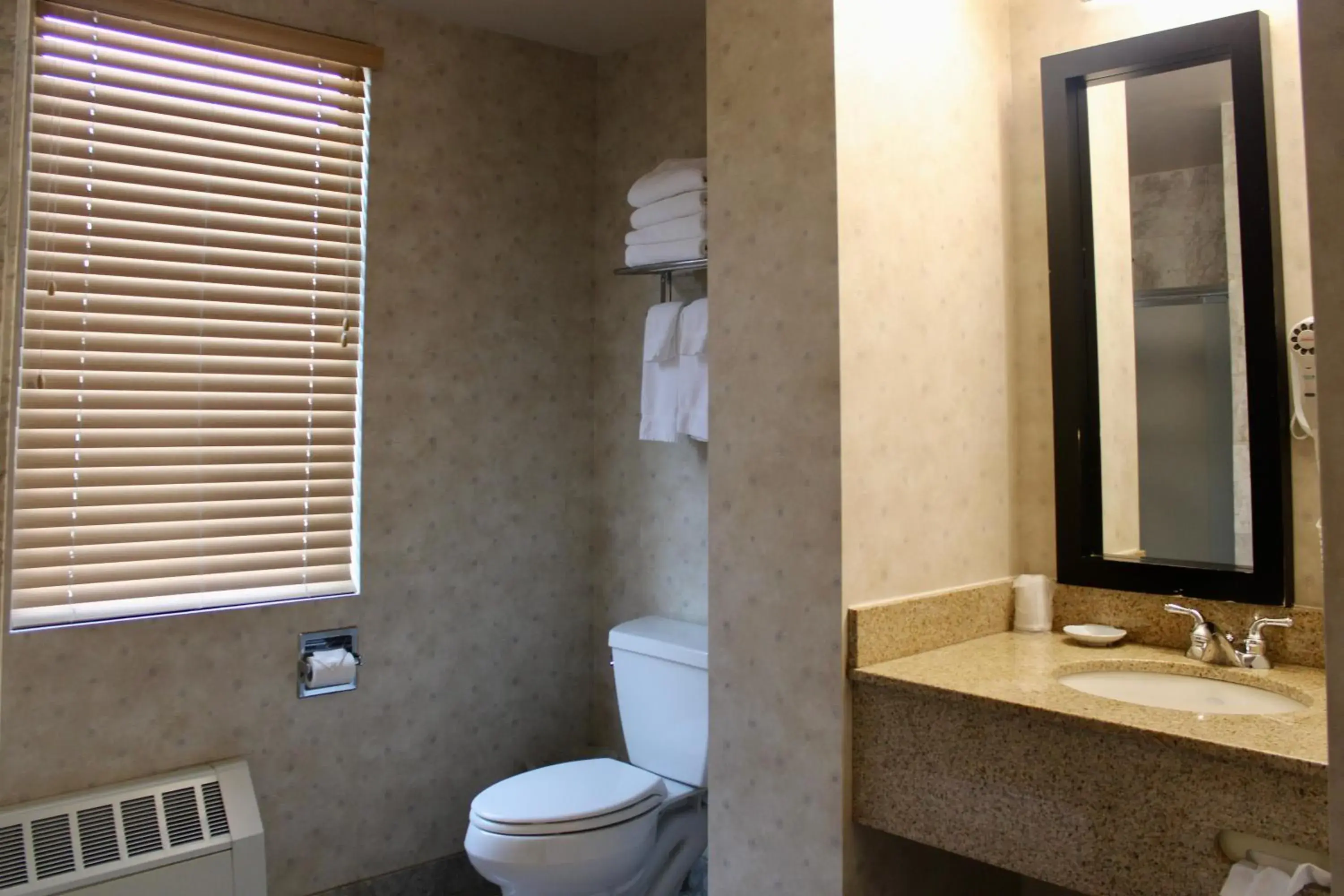 Bathroom in Marco LaGuardia Hotel & Suites Bathroom in Marco LaGuardia Hotel & Suites