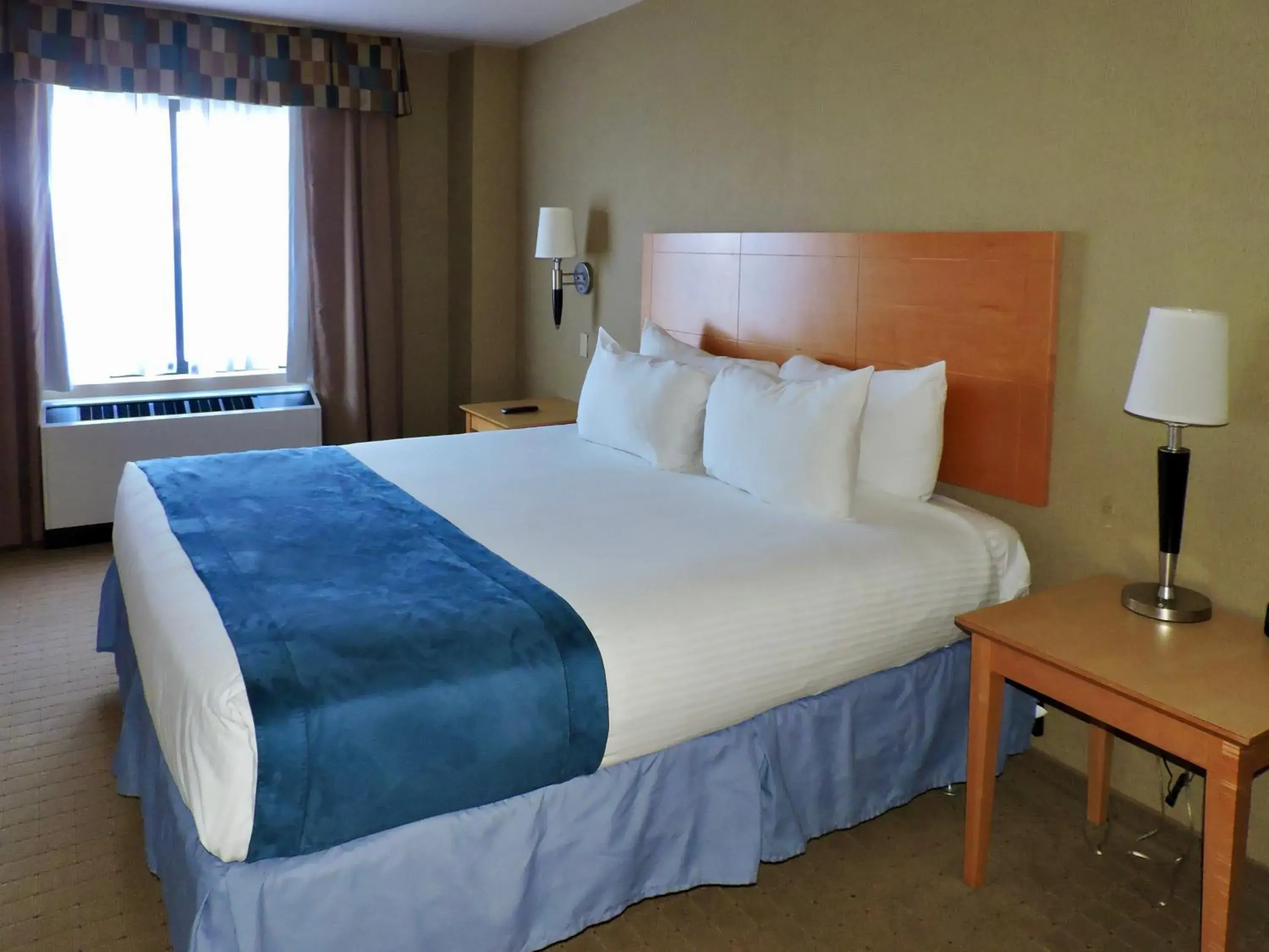 Bed in Marco LaGuardia Hotel & Suites Bed in Marco LaGuardia Hotel & Suites