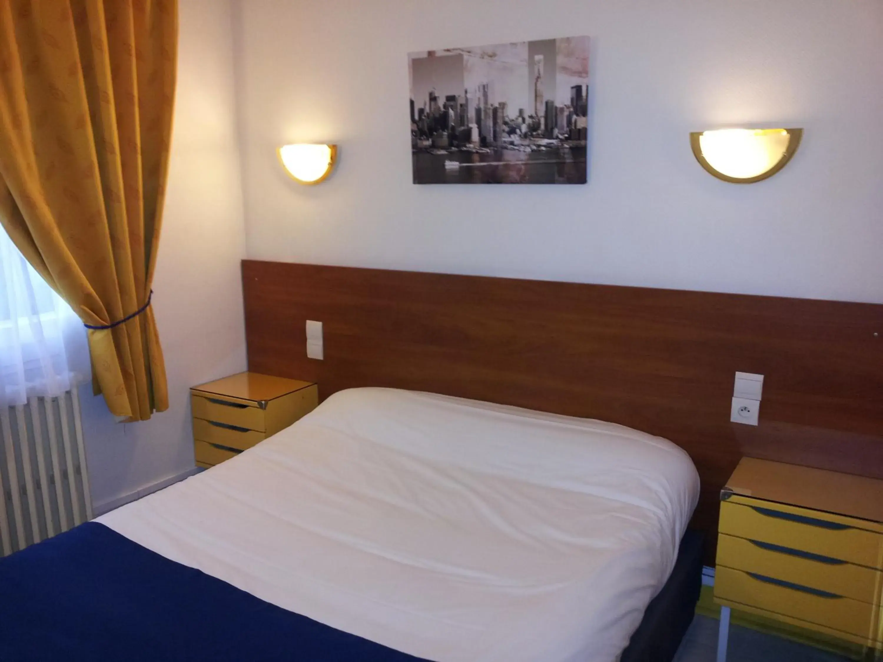 Economy Double Room for 1- 2 People in Hôtel Du Stade Economy Double Room for 1- 2 People in Hôtel Du Stade