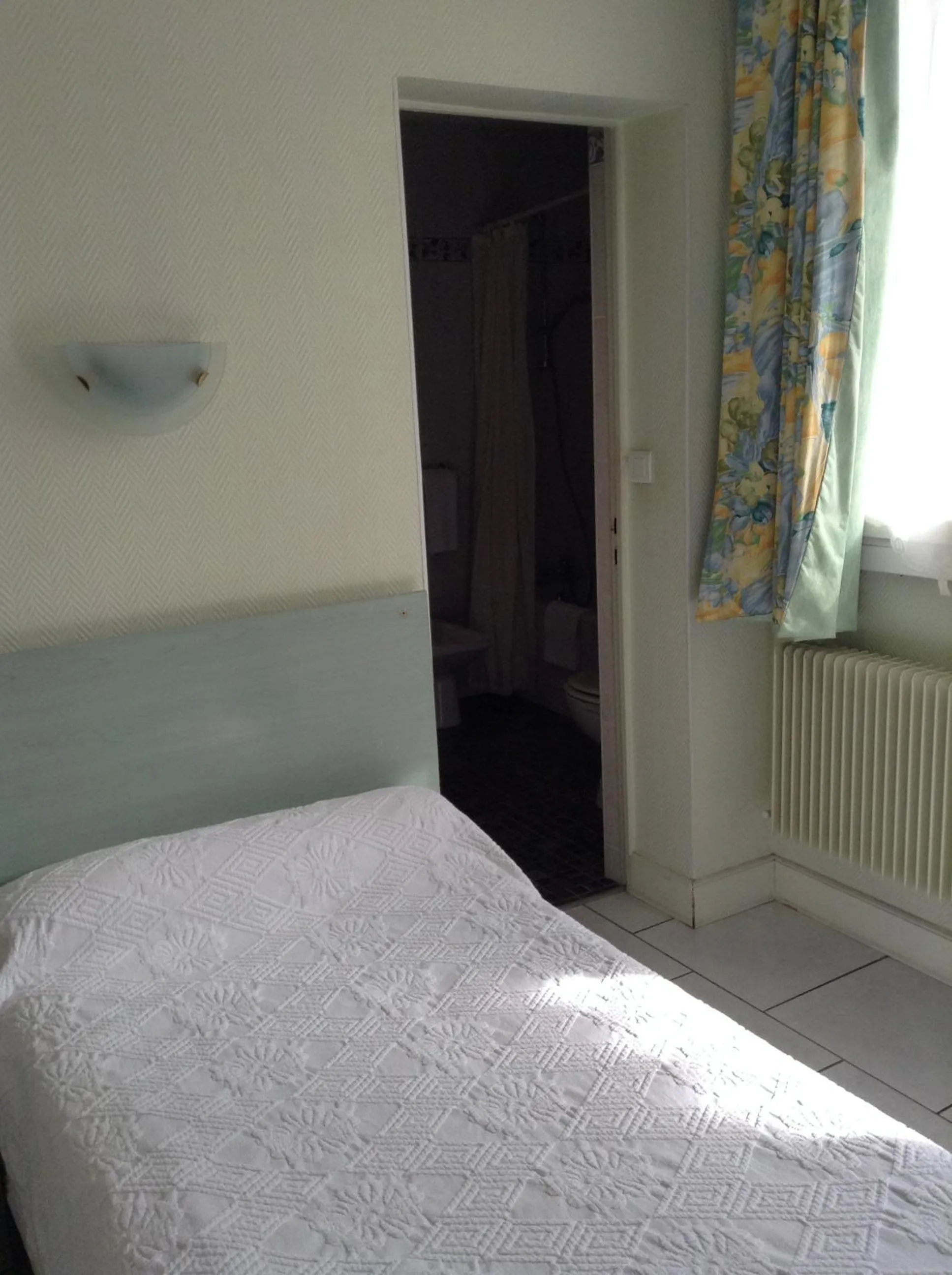 Photo of the whole room, Bed in Hôtel Du Stade