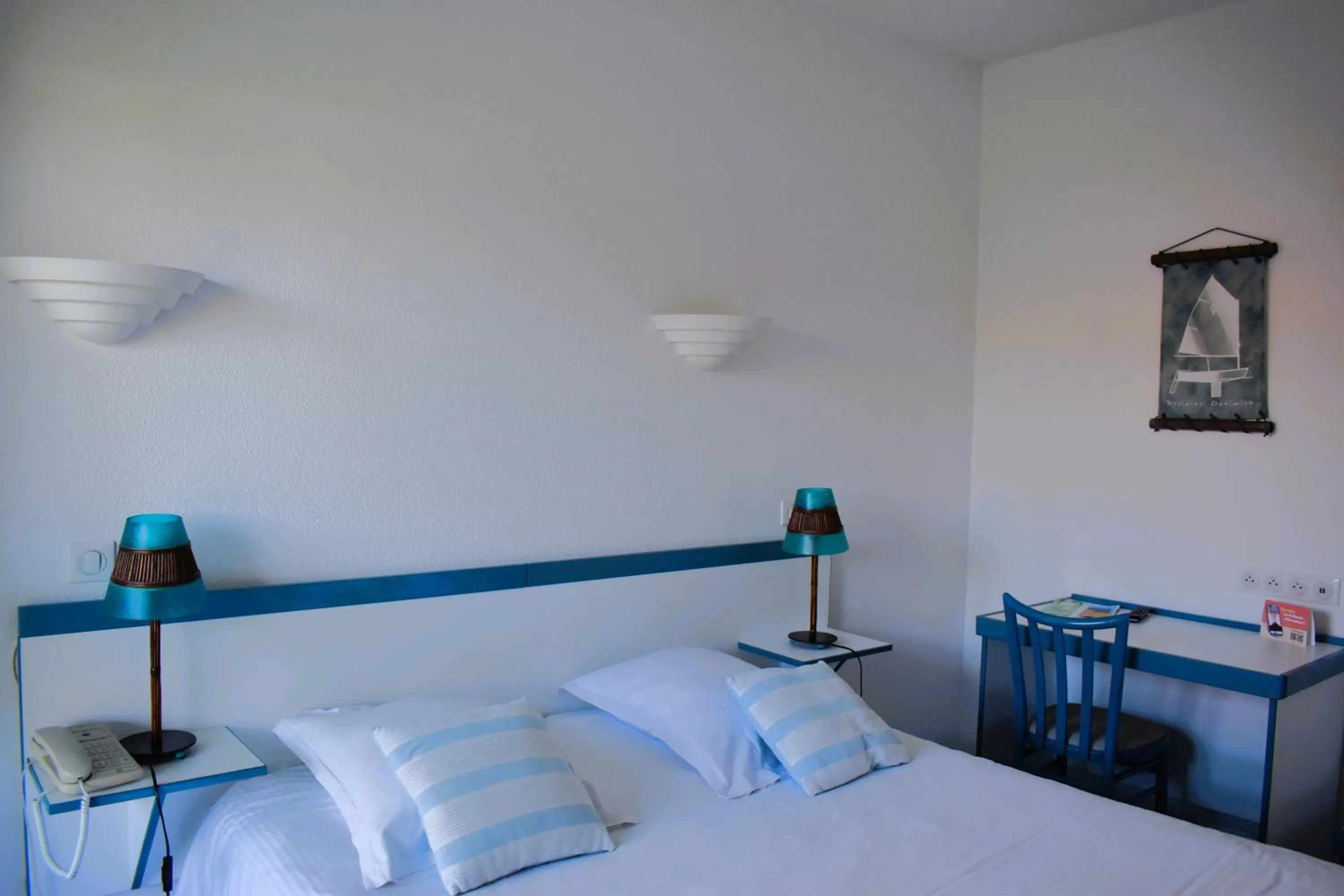 Bed in Hôtel Orange Marine