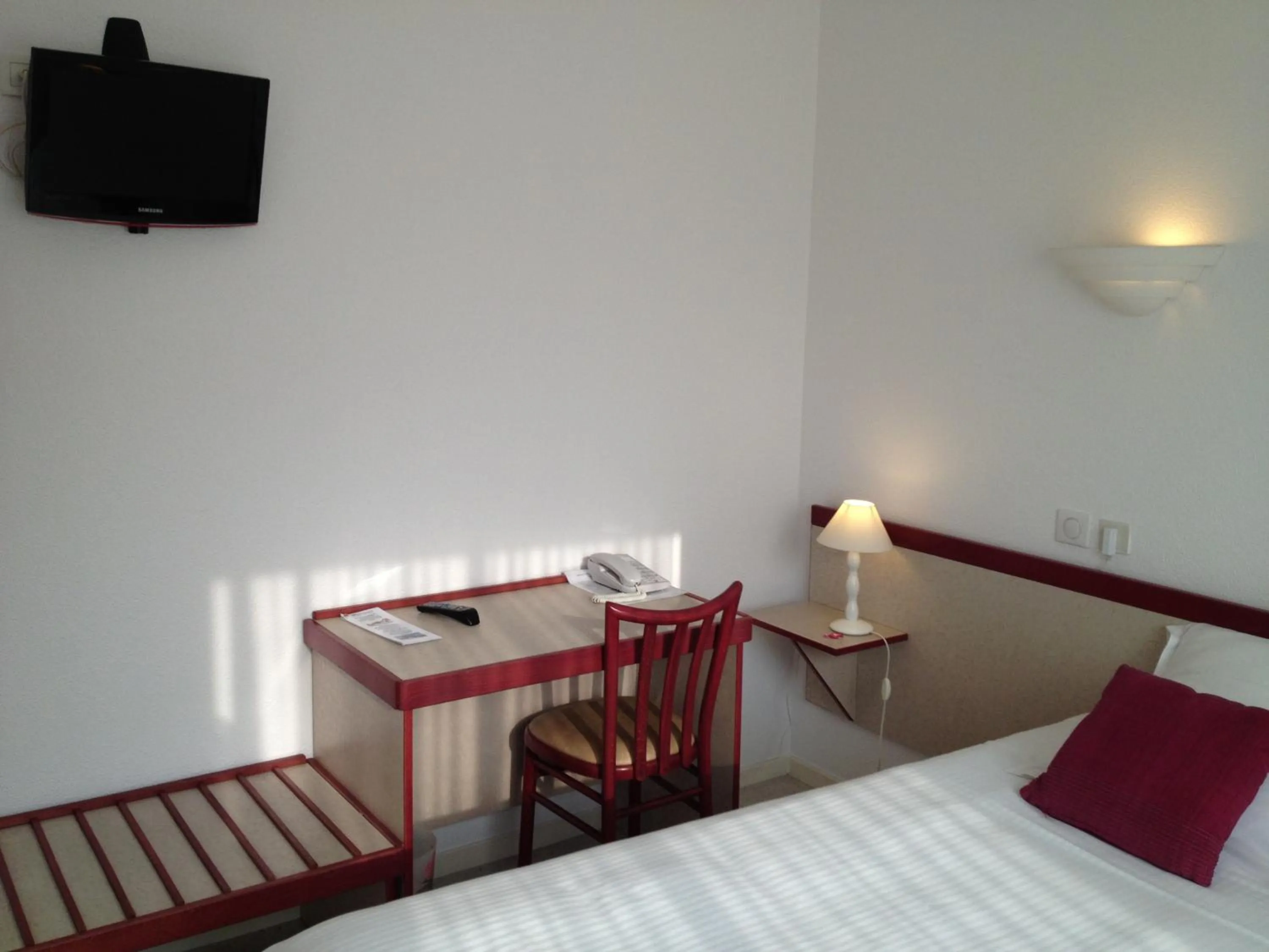 Bed in Hôtel Orange Marine