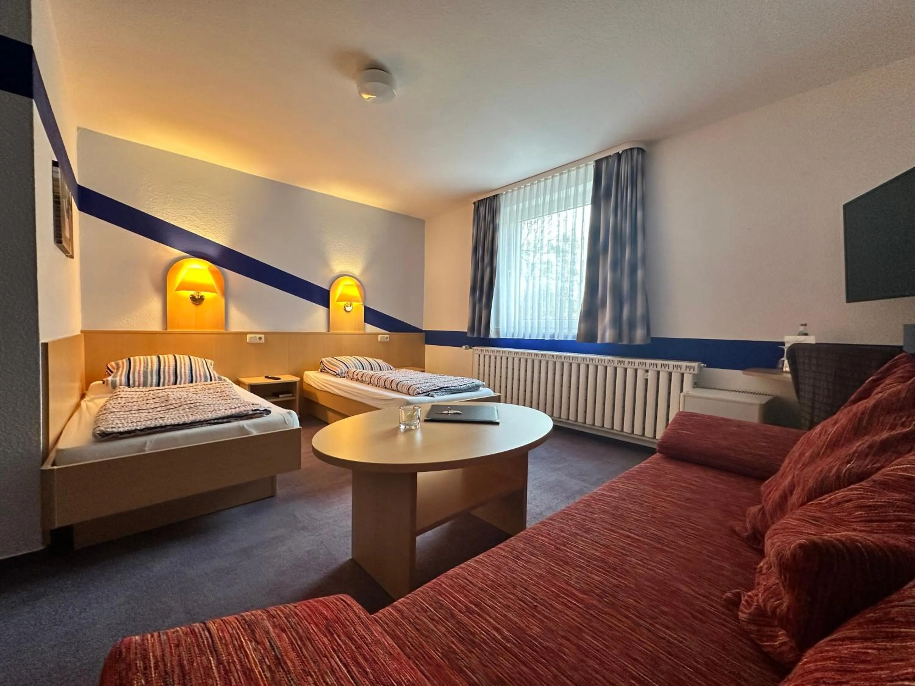 Bed in Zeitwohnen Wolfsburg, ehemals Hotel am Klieversberg ein Unternehmen der Micha'S Hotelbetriebe