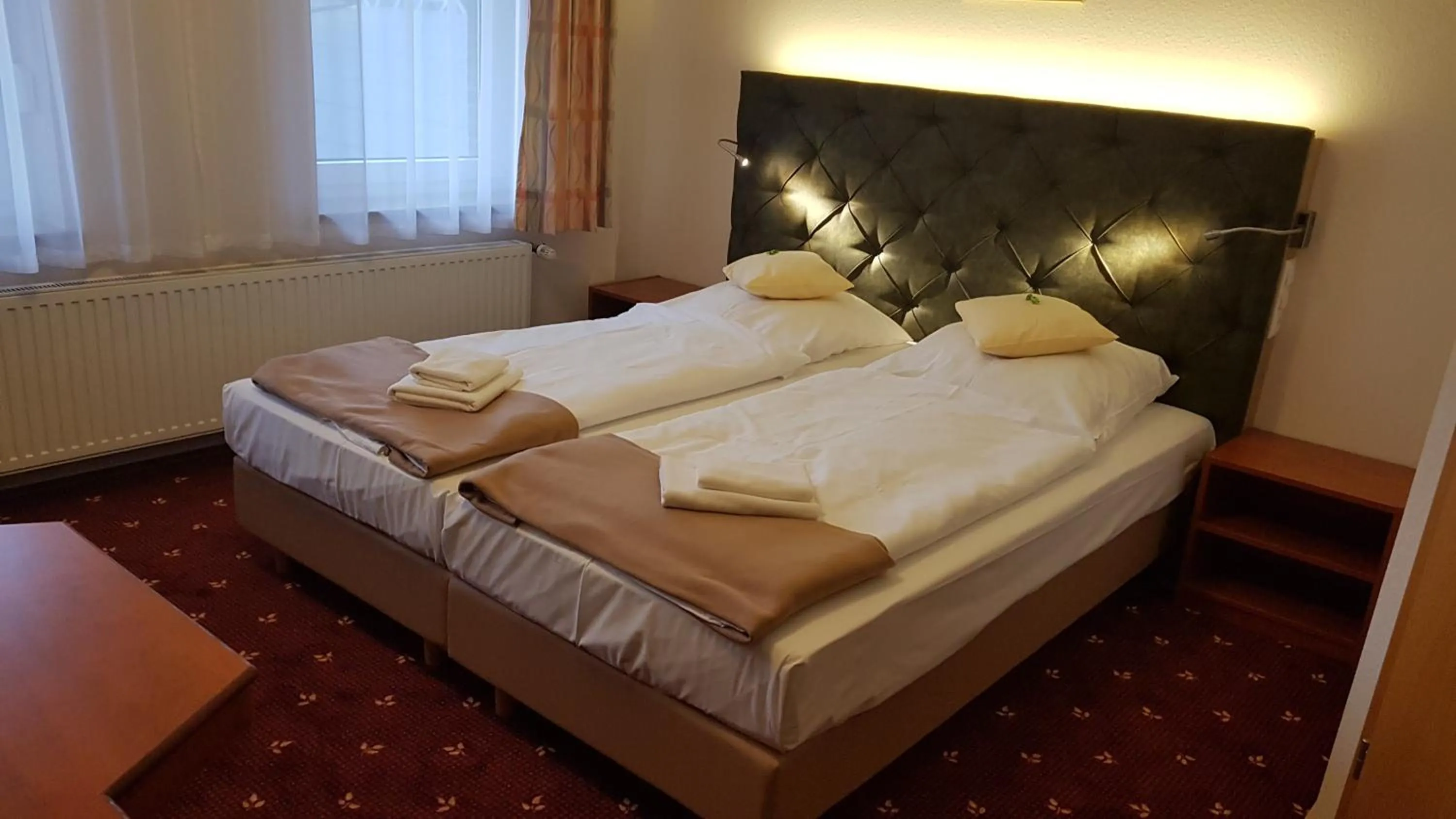 Photo of the whole room, Bed in Kräuterhotel & Restaurant Heidejäger