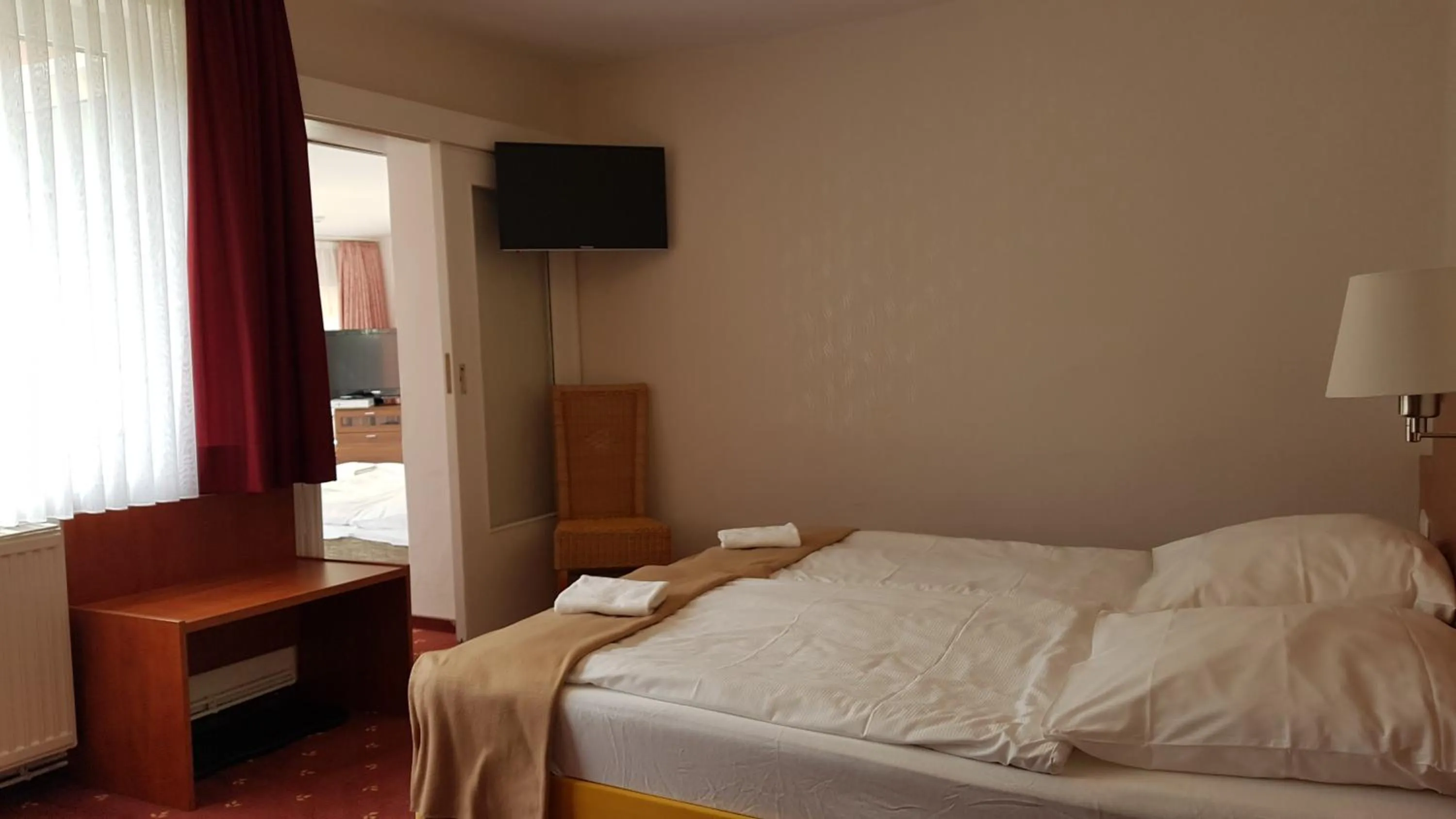 Photo of the whole room, Bed in Kräuterhotel & Restaurant Heidejäger