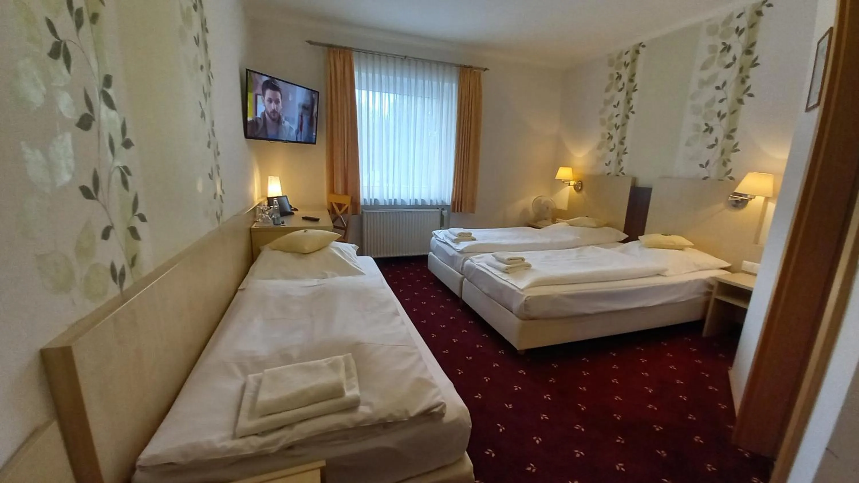 Photo of the whole room, Bed in Kräuterhotel & Restaurant Heidejäger