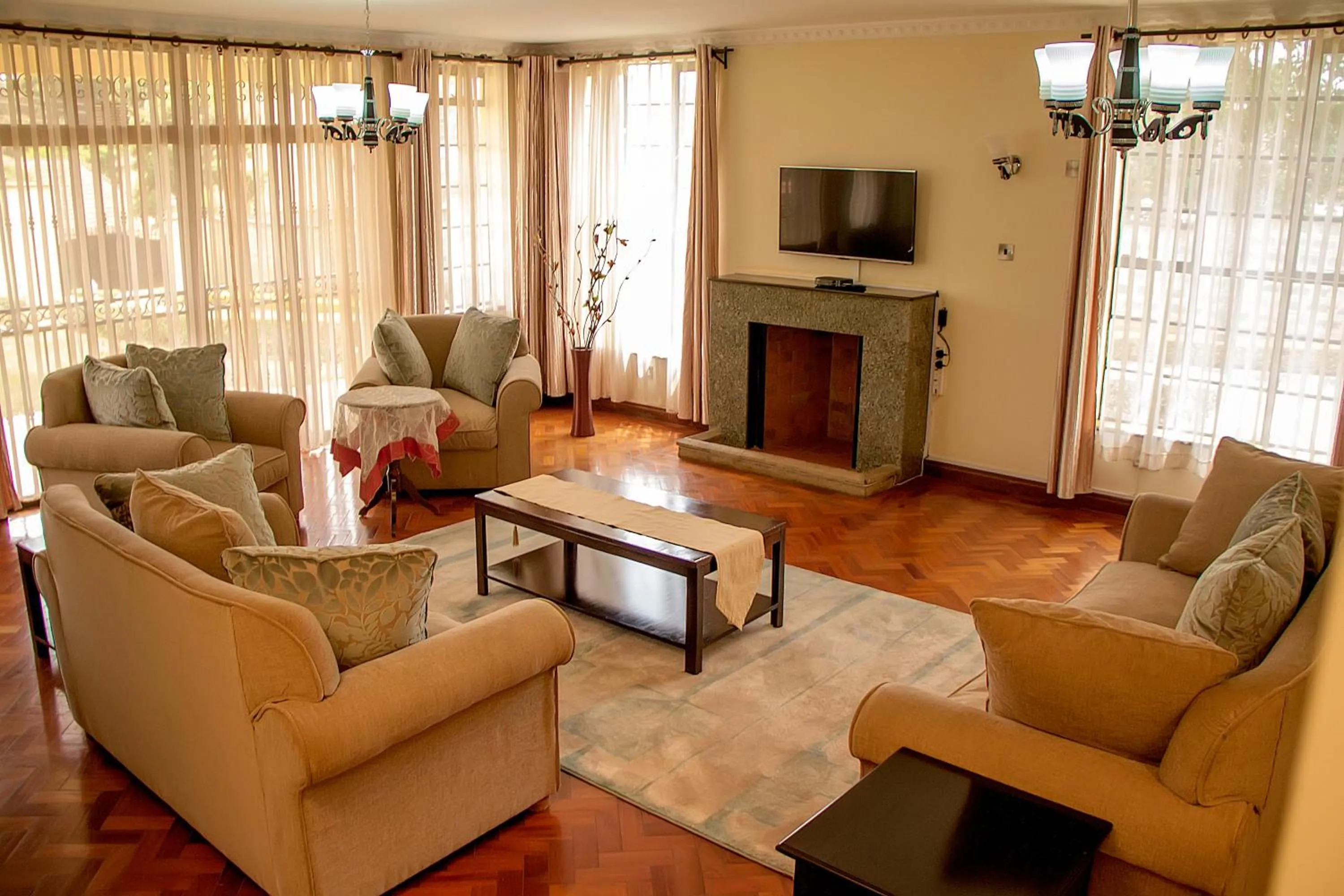 Communal lounge/ TV room in Orchid Homes, Gigiri