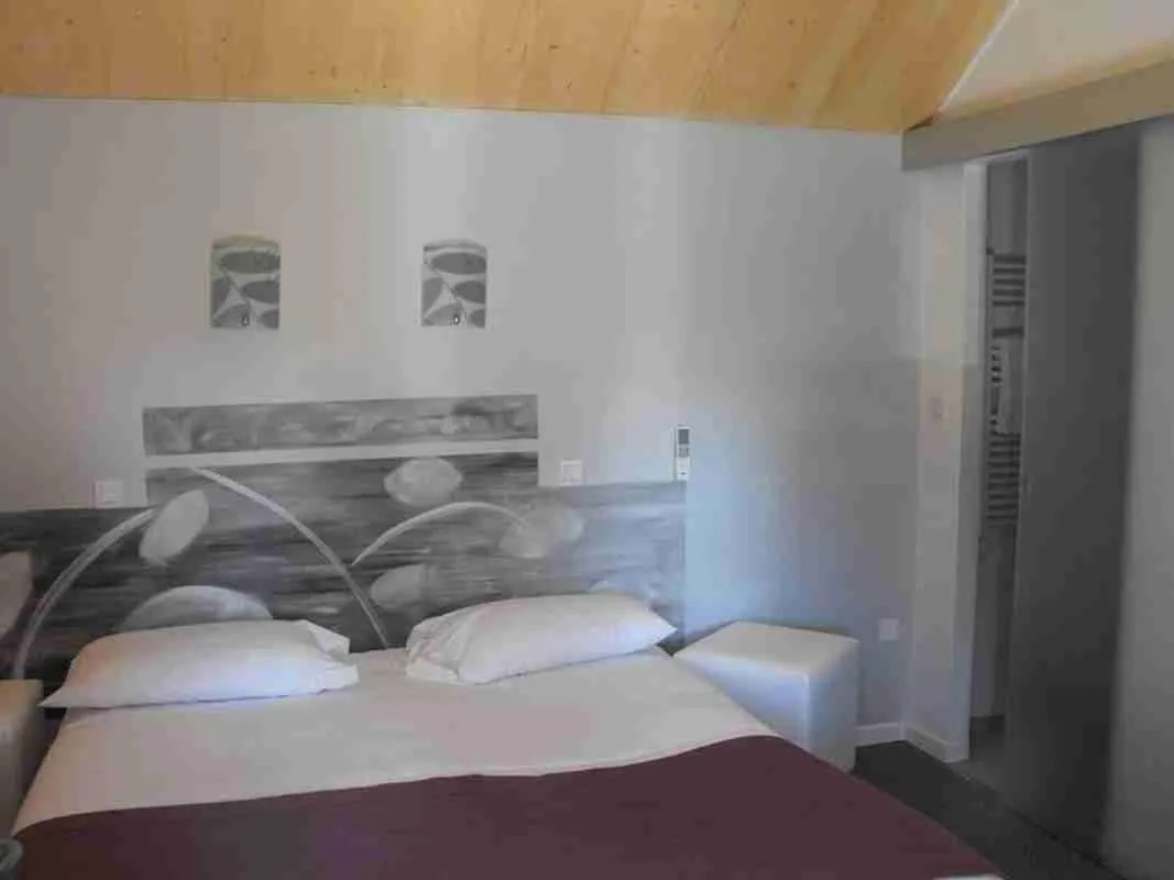 Photo of the whole room, Bed in Logis Hôtel Restaurant Les Capucins