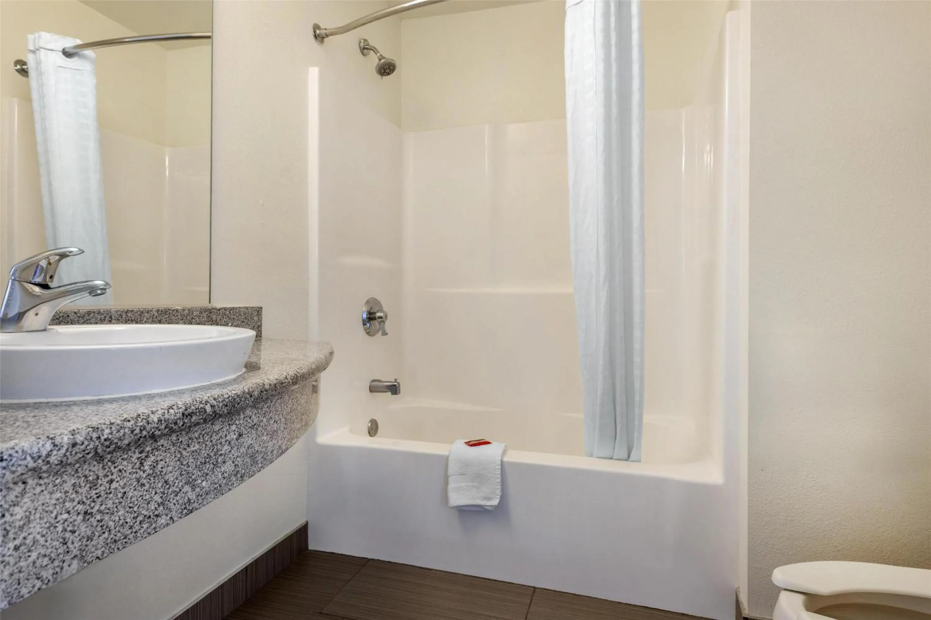 Bathroom in SureStay Plus Hotel by Best Western Niagara Falls East
