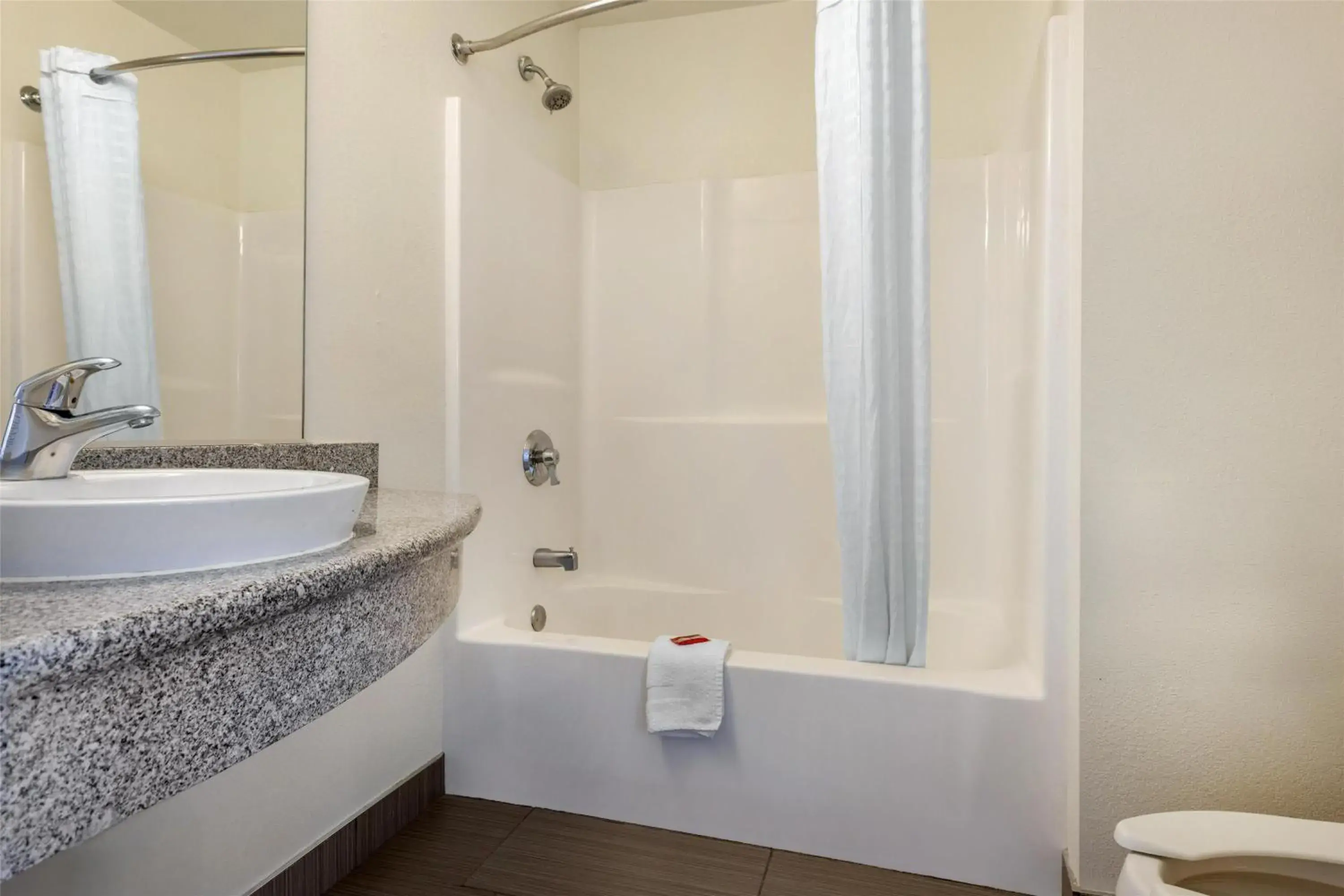 Bathroom in SureStay Plus Hotel by Best Western Niagara Falls East Bathroom in SureStay Plus Hotel by Best Western Niagara Falls East