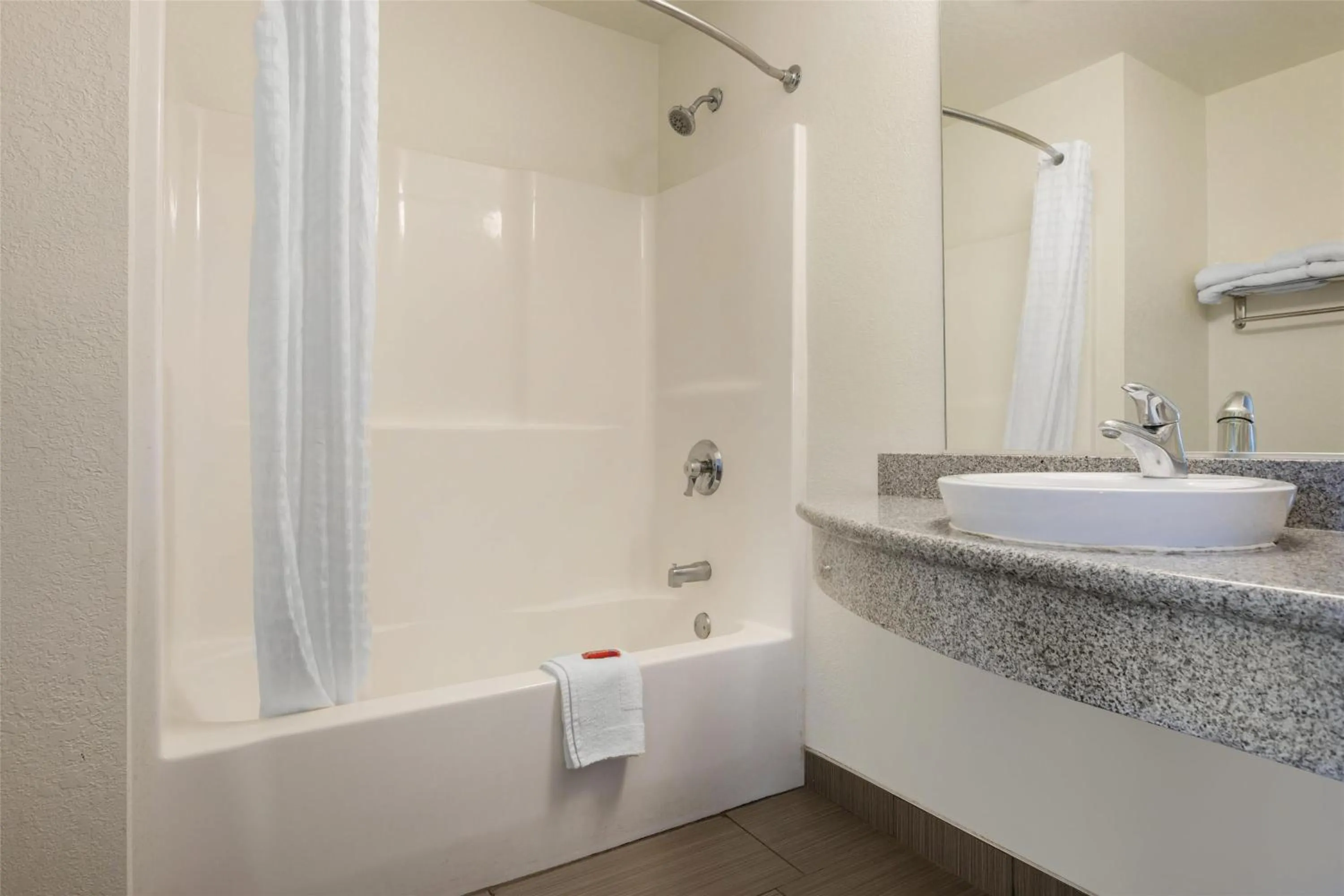 Bathroom in SureStay Plus Hotel by Best Western Niagara Falls East