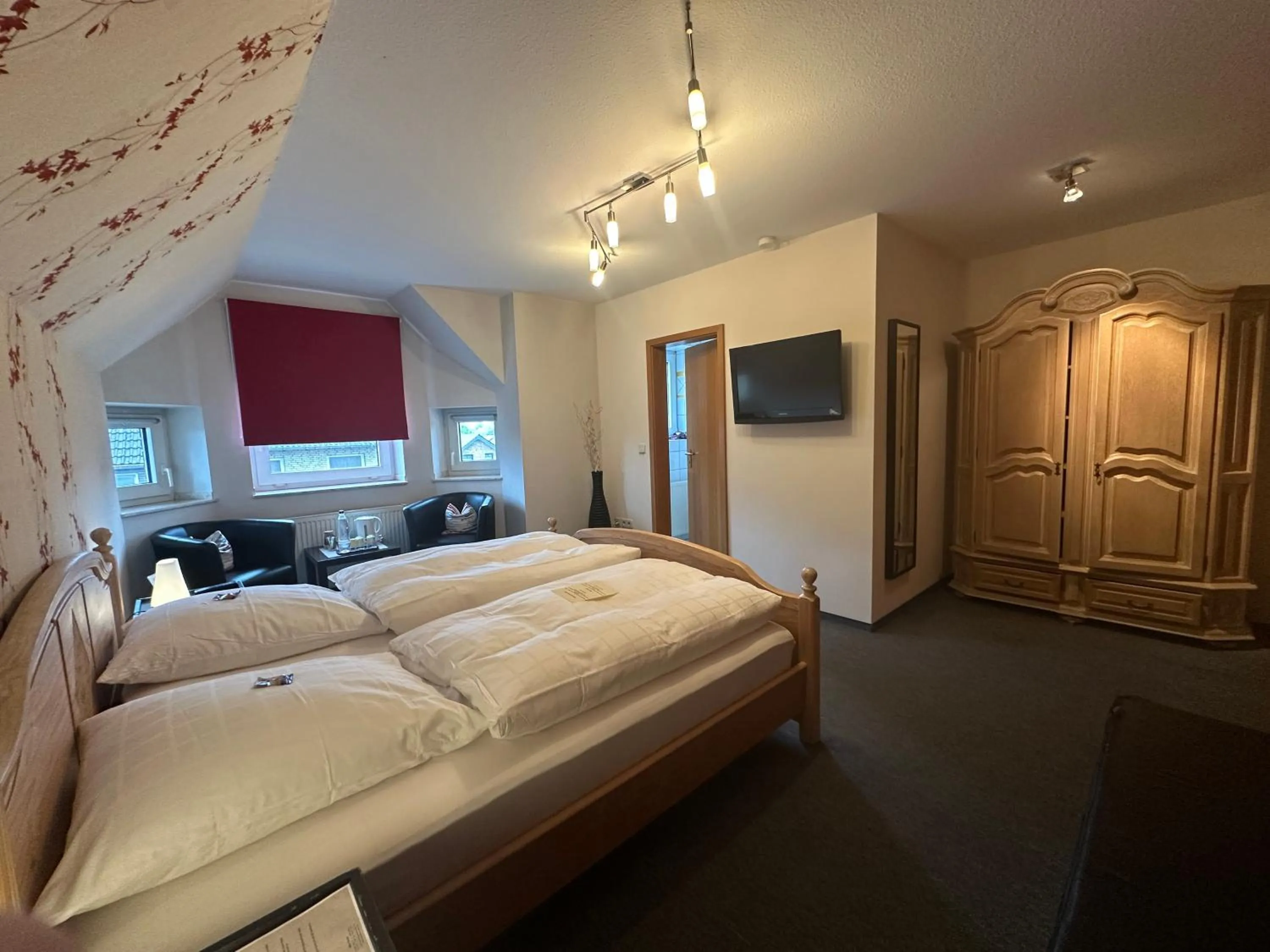 Photo of the whole room, Bed in Landgasthaus Hotel Wolters