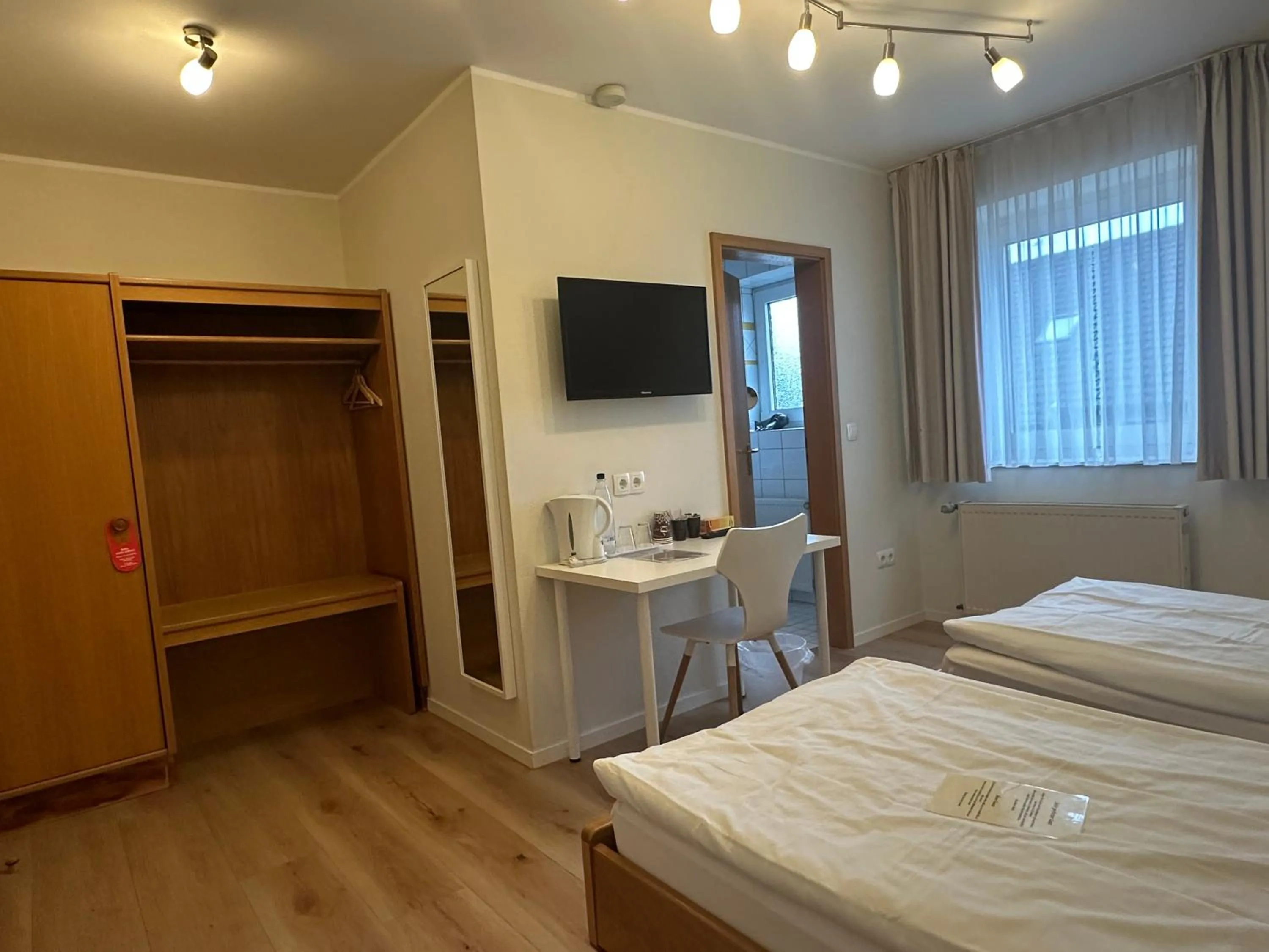 Photo of the whole room, Bed in Landgasthaus Hotel Wolters